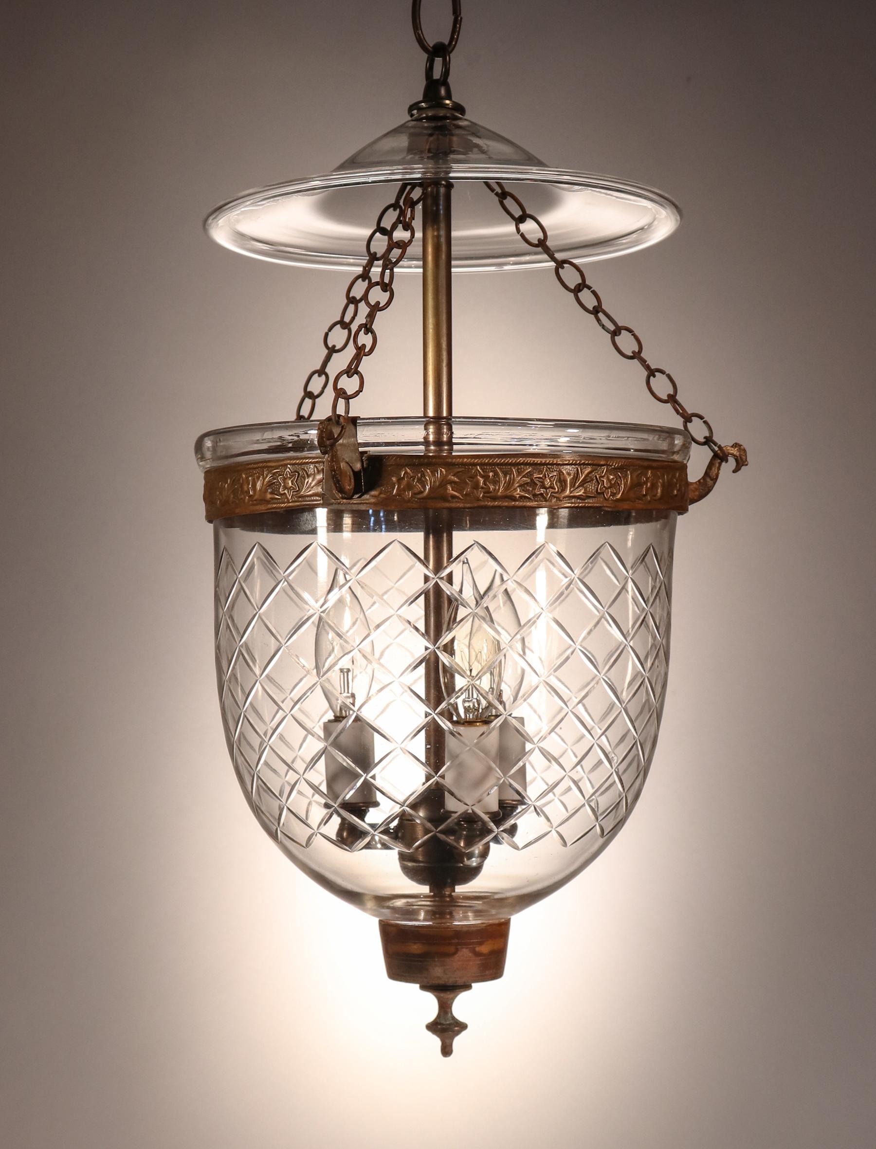 An especially beautiful bell jar lantern from our collection with pleasing form and a finely etched diamond motif. This circa 1870 pendant features outstanding quality hand blown glass, as well as all-original fittings, including its original smoke