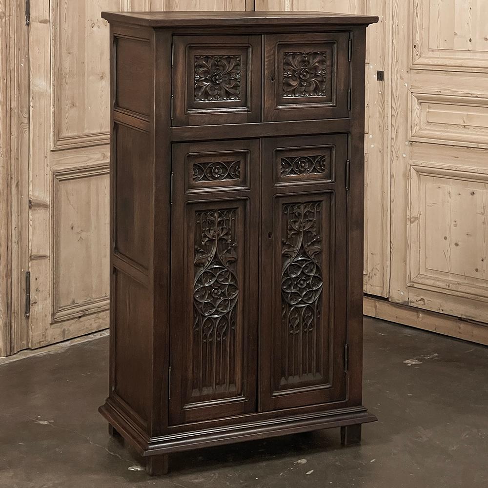 Antique Petite French Gothic Bonnetiere ~ Cabinet is a truly unusual find, indeed!  Measuring just over four and a half feet tall, it is only two and a half feet wide at its widest, making it a great choice for narrow spots especially those
