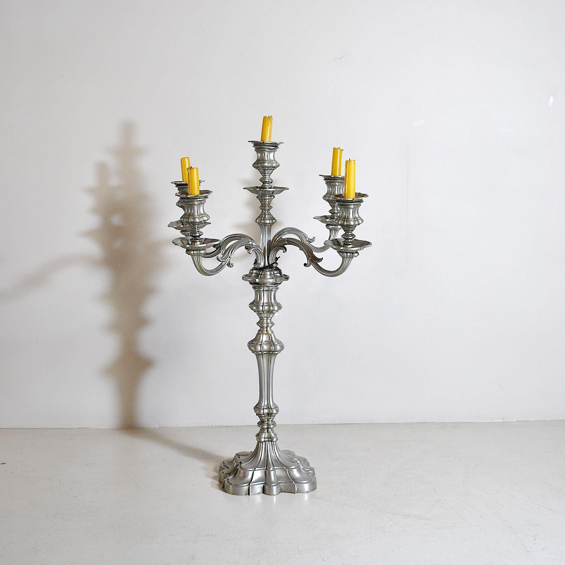 Antique pewter candleholders.