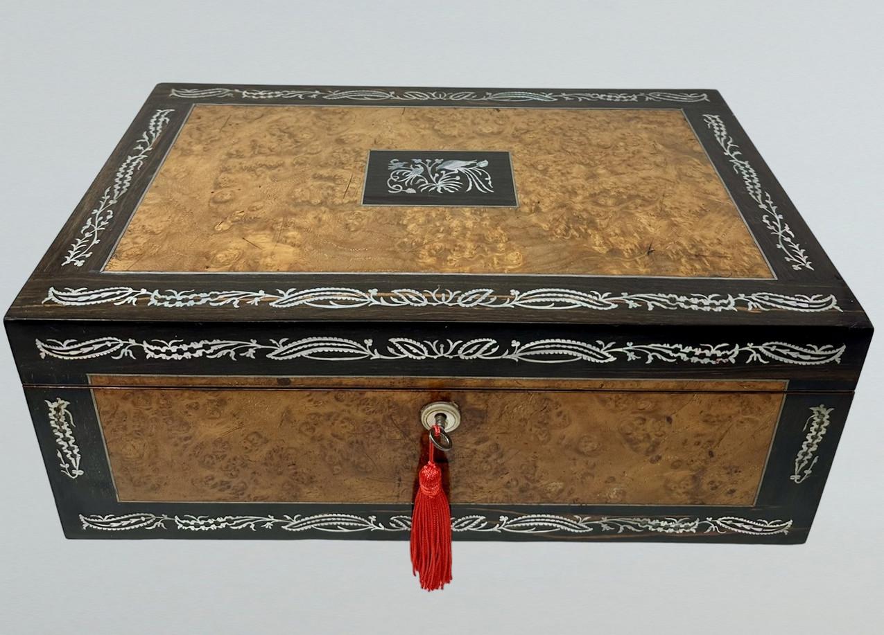 An Exceptionally Fine Quality English Well Figured Burl Amboyne and Coromandel Ladies or Gents English early Travelling Writing Slope of outstanding quality and unusually large proportions, with quite unusual Pewter strung inlay and highly ornate