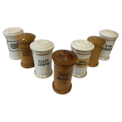 Antique pharmacy vessels made of porcelain and wood from 1900