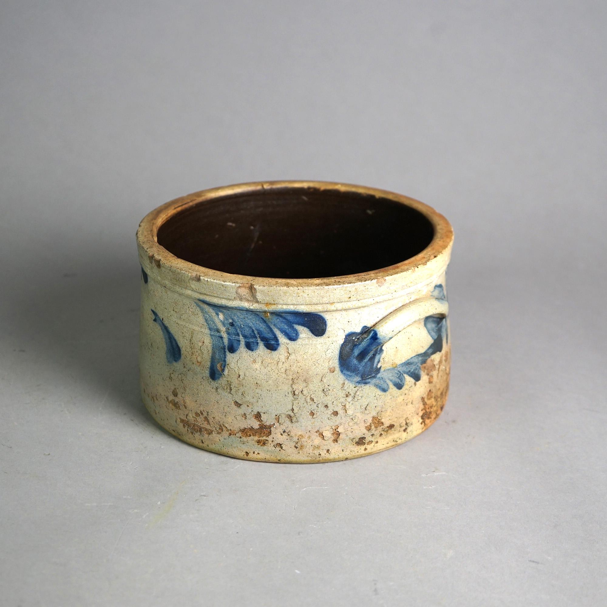 An antique Philadelphia cake crock offers stoneware construction with double handles and blue decoration in foliate design, c1870

Measures - 4.75