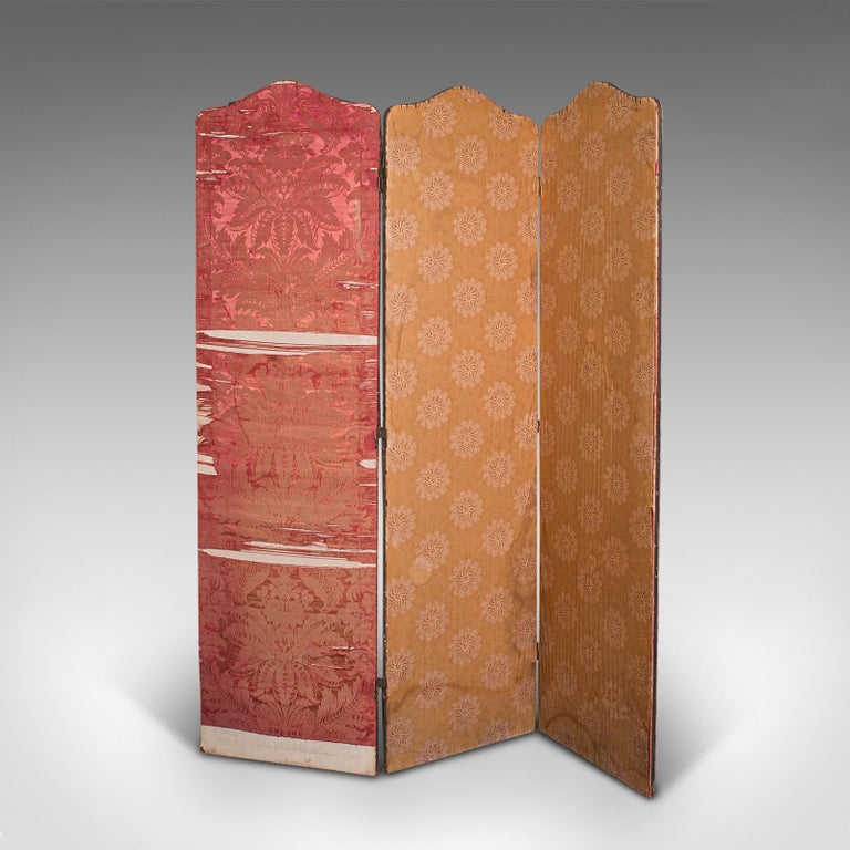 This is an antique photographer's prop screen. An English, three fold privacy screen or room divider, dating to the late Victorian period, circa 1900.

Presented as found, replete with fine character
Displays a desirable, well aged patina
Three