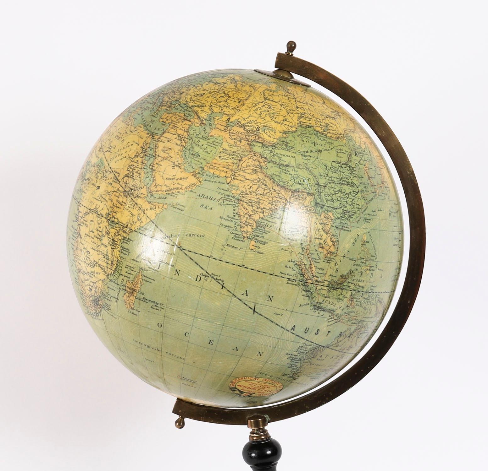 A fine antique Belgian 19th century Physical and Political library globe on stand by Merzbach & Falk,  Brussels, dated 1881.

The patented globe was published by Merzbach & Falk in assocation with the Geographical Instute of Brussels. It is raised