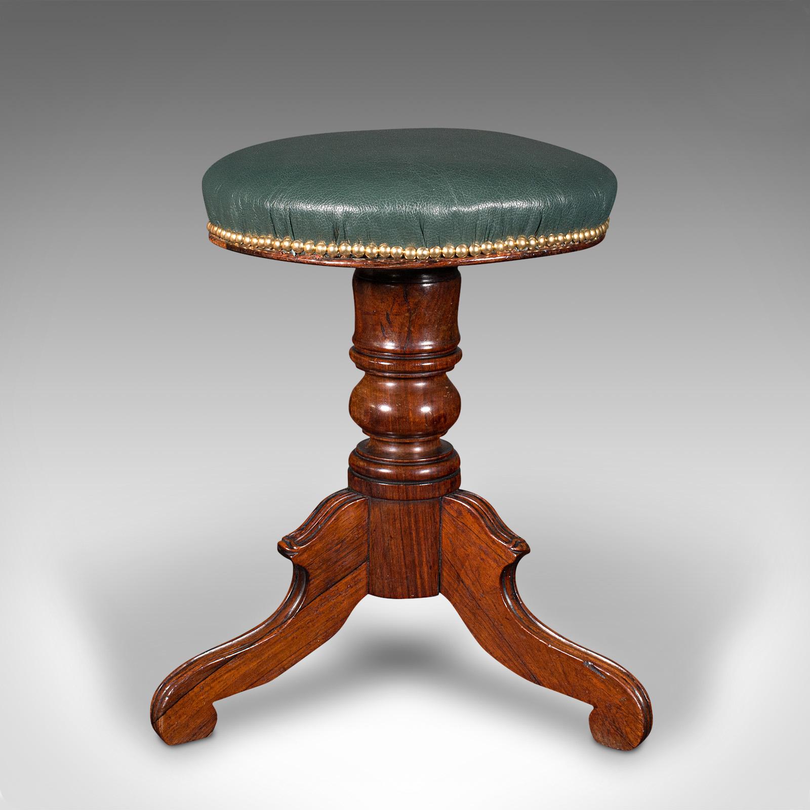 This is an antique piano stool. An English, rosewood and leather rising recital or dressing stool, dating to the early Victorian period, circa 1850.
 
Delightfully crafted stool with quality leather covering
Displays a desirable aged patina and