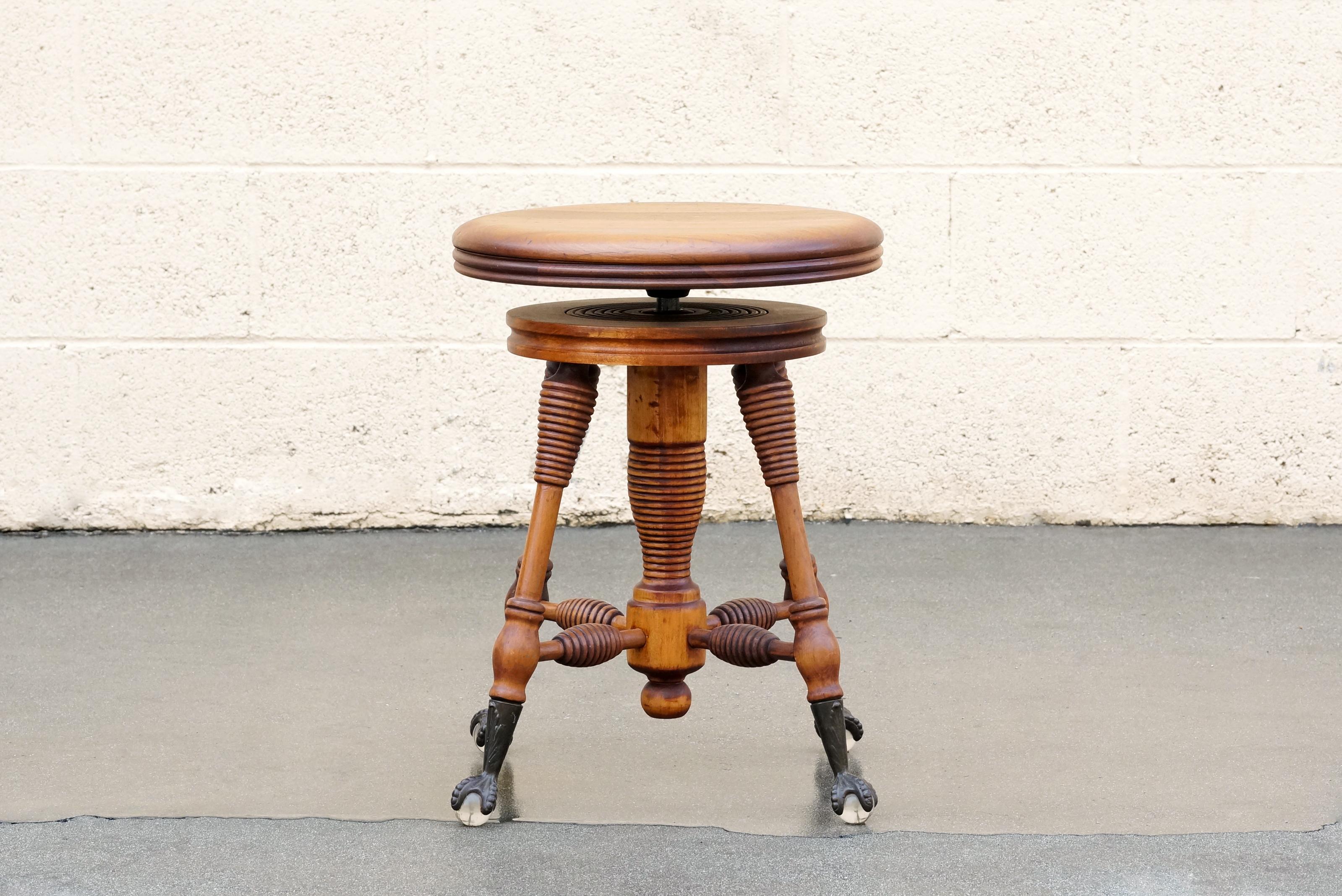 Antique oak piano stool with a unique 