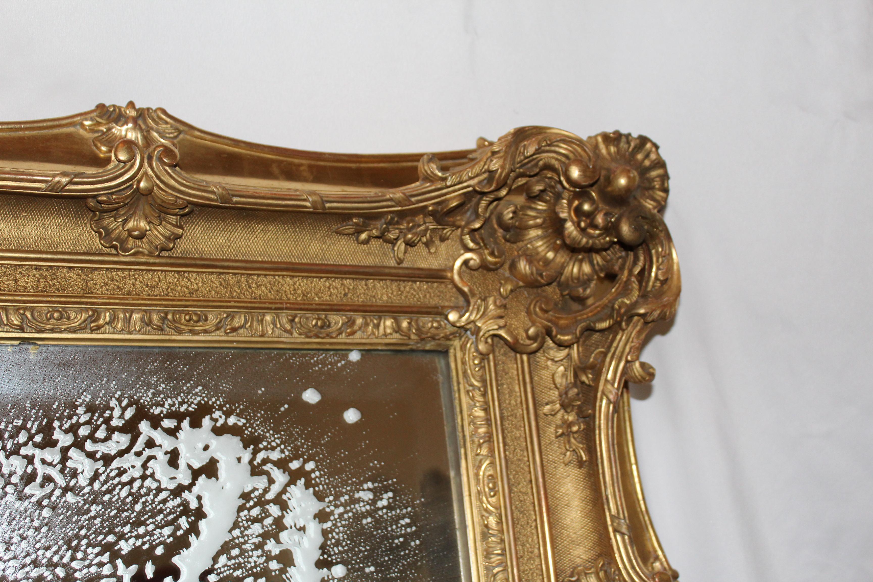 A Hi-Quality Large gold leaf French picture frame bought in Paris 30 years ago by me and kept in a Private home. Might be made around 1900,not sure .Installed with a beveled mirror 36 x 31. Old repairs to the gold leaf, not a lot. Very heavy as it