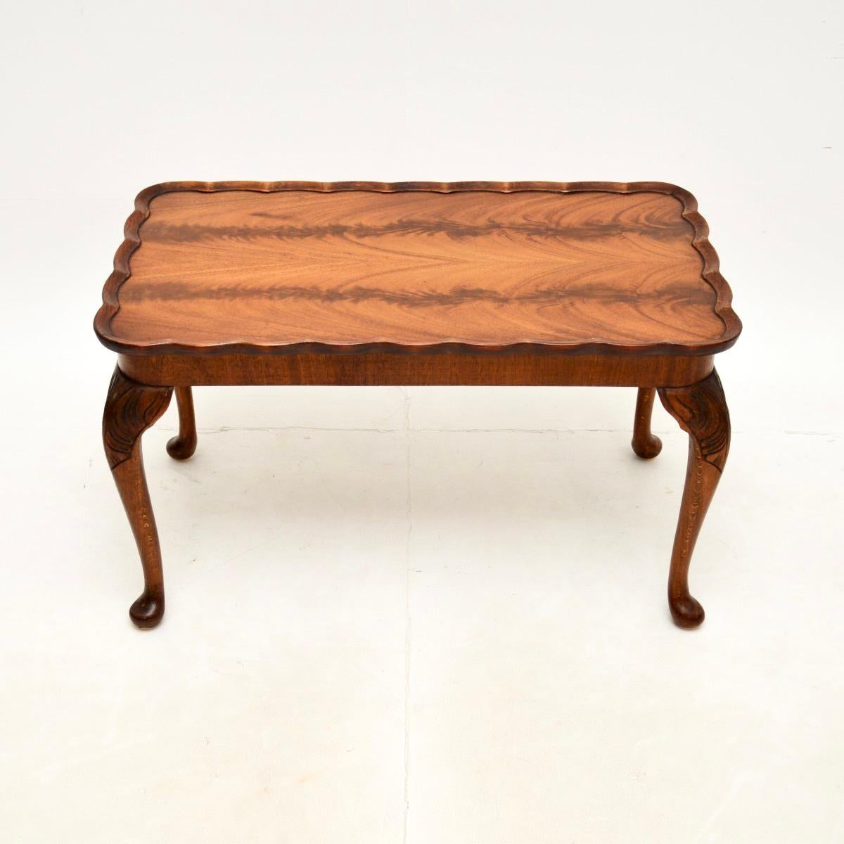 A lovely antique pie crust coffee table. This was made in England, it dates from around the 1930’s.

It is a lovely size and is of great quality. The top has wonderful grain patterns, this sits on cabriole legs with acanthus leaf carving at the