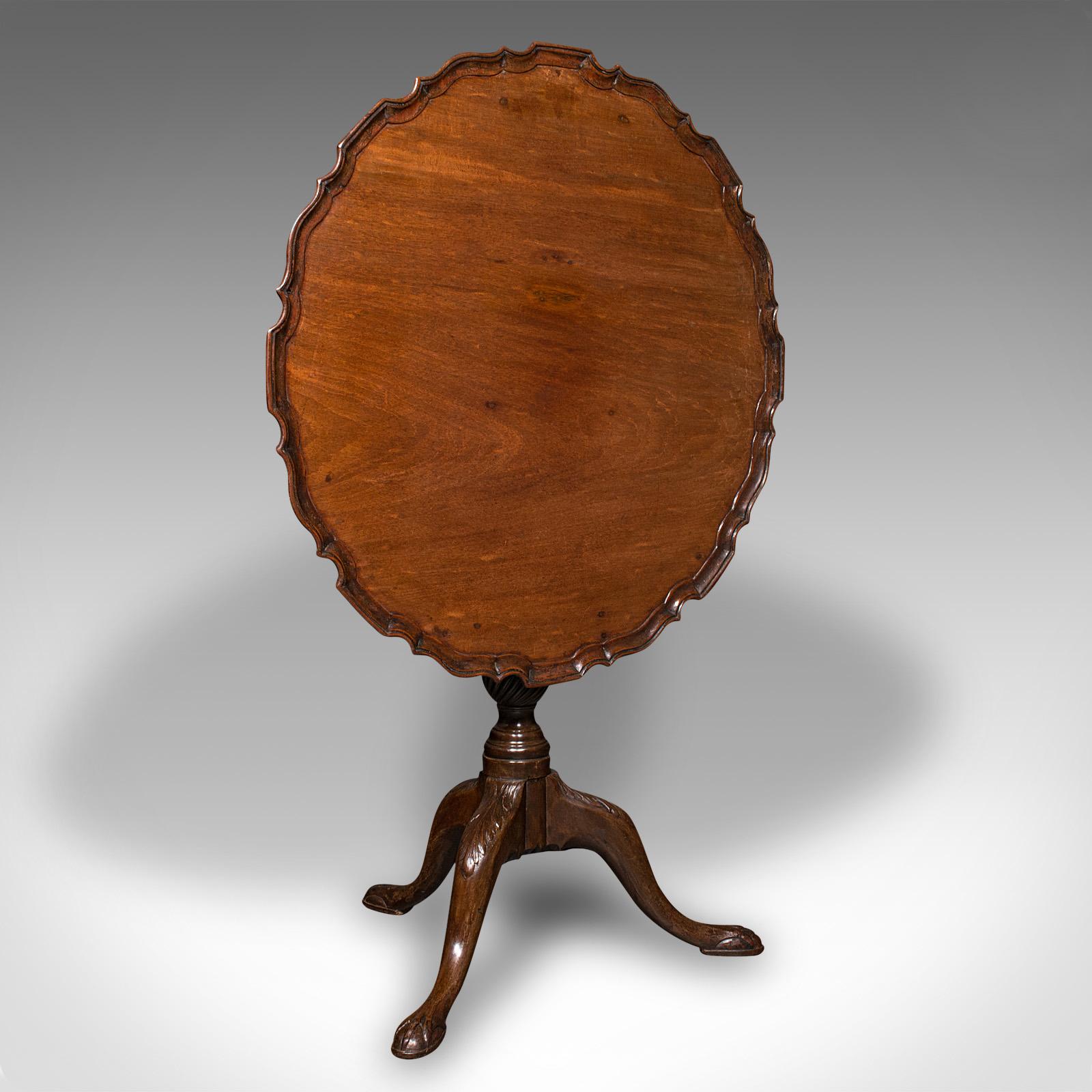 This is an antique pie crust table. An English, mahogany tilt-top occasional table, dating to the Victorian period, circa 1870.

Charmingly decorative top, of generous size and appealing craftsmanship
Displays a desirable aged patina and in good