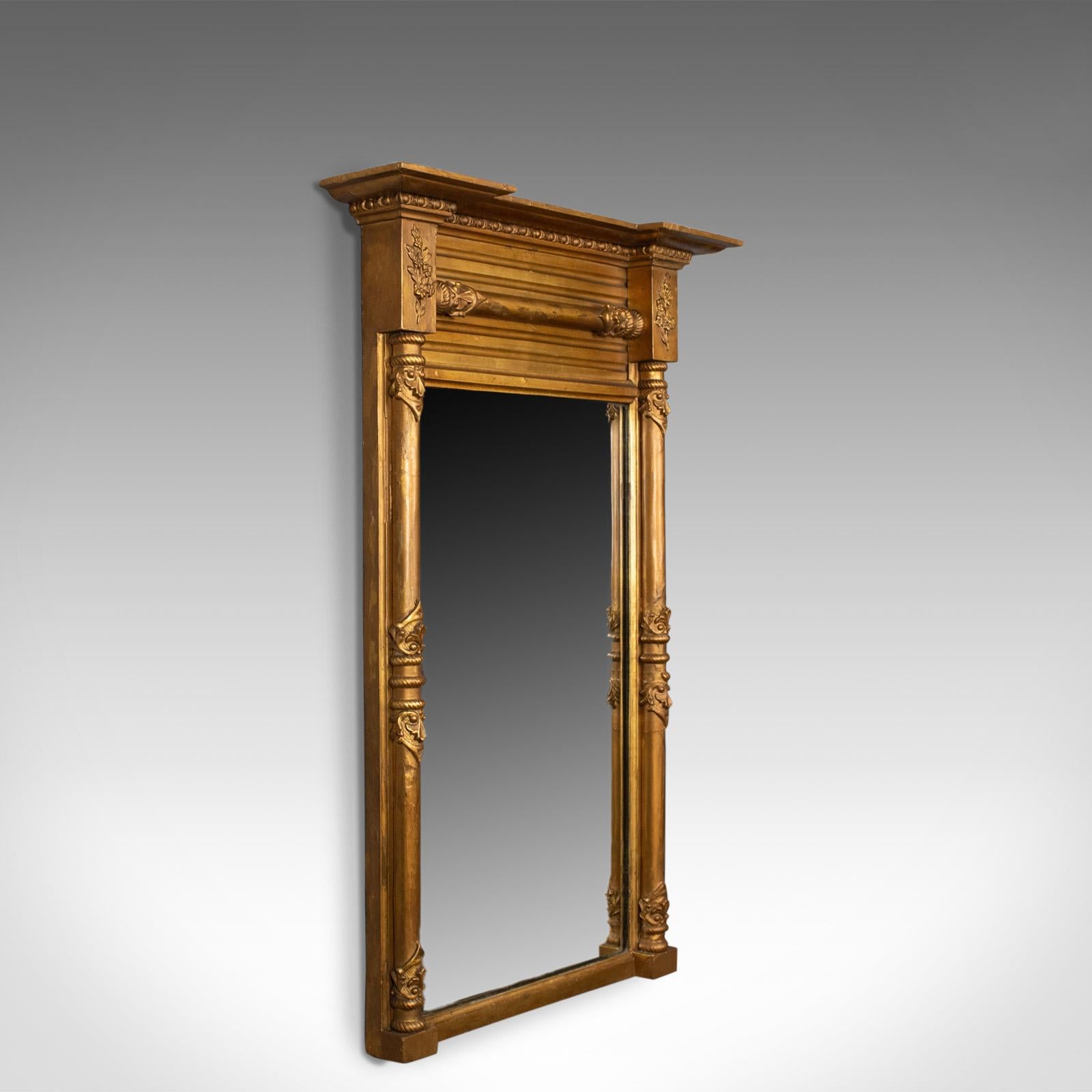 This is an antique pier mirror. A Regency, giltwood wall mirror dating to the early 19th century, circa 1820.

Attractive mellow golden tones in the giltwood frame
A refined mirror, mid-sized with a good finish and desirable aged patina
Superb