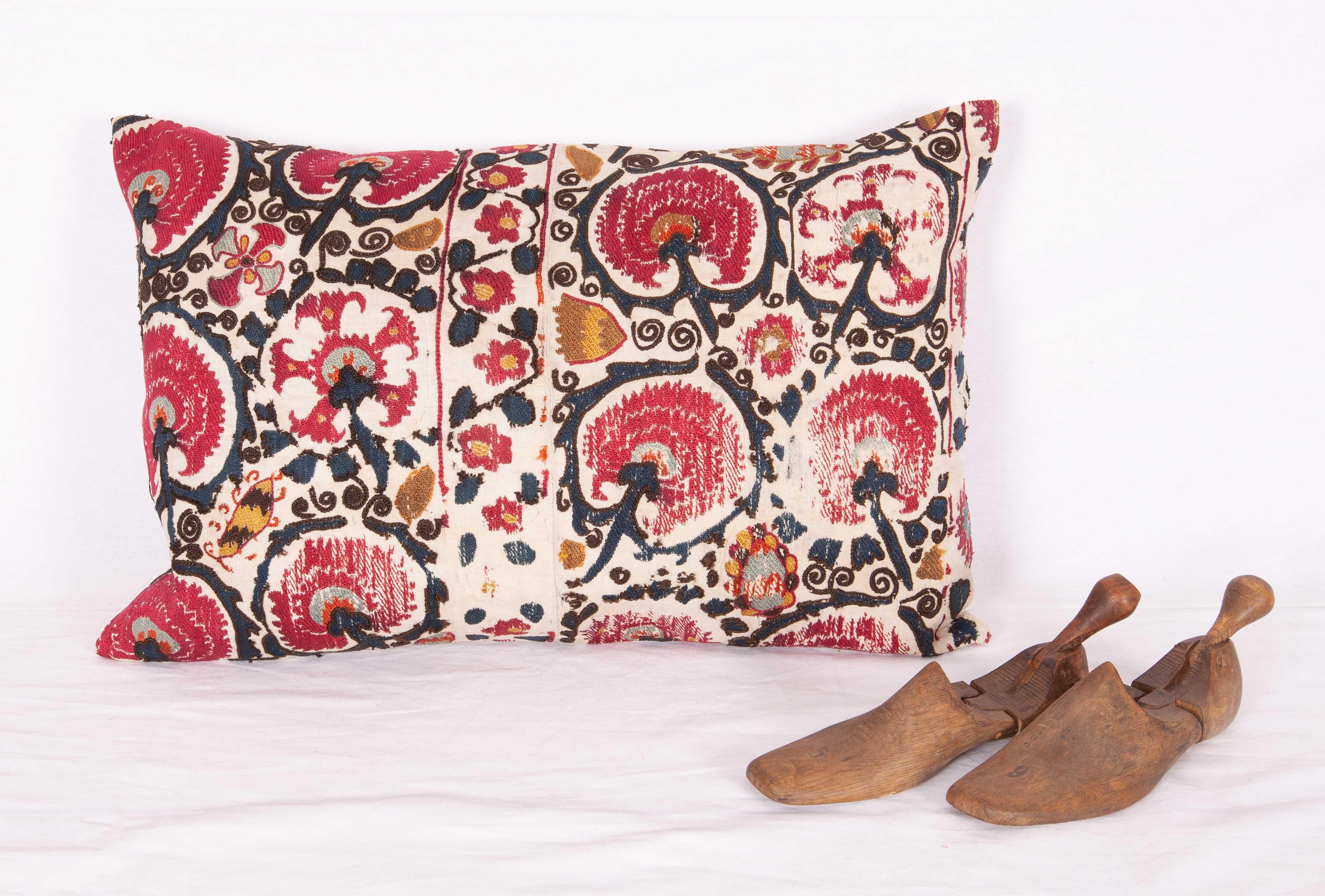 The pillow case is made from an antique Tajik Suzani from Ura Tube. It is silk embroidery on a handwoven cotton field. The backing is pure linen, and they do not come with inserts but bags made to the size in cotton to accommodate insert materials.