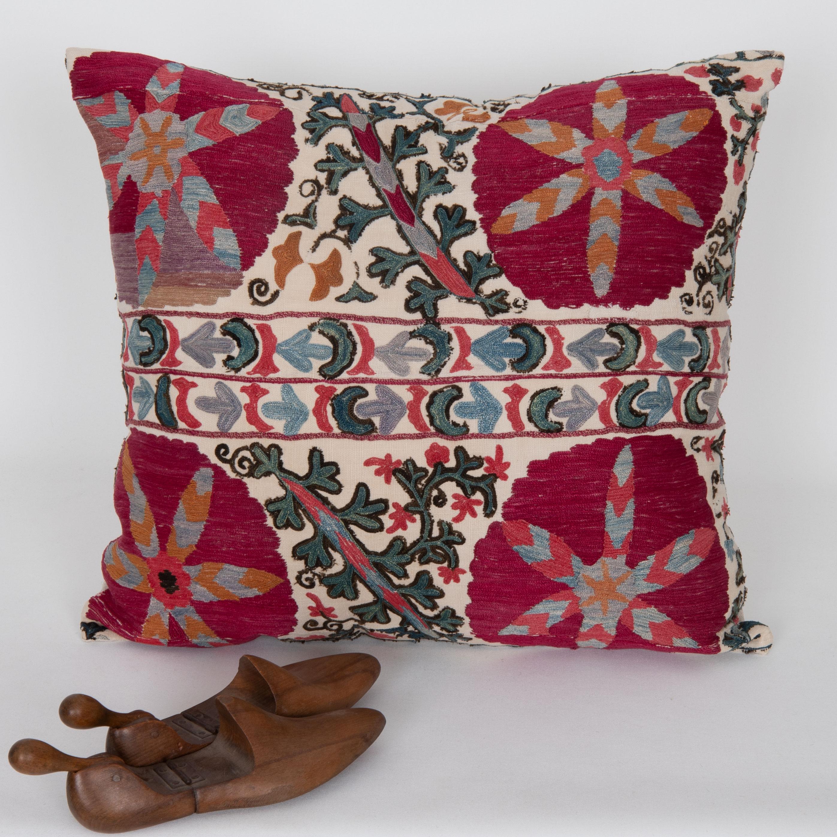 Uzbek Antique pillow cover Made from a 19th C. Suzani Fragment For Sale