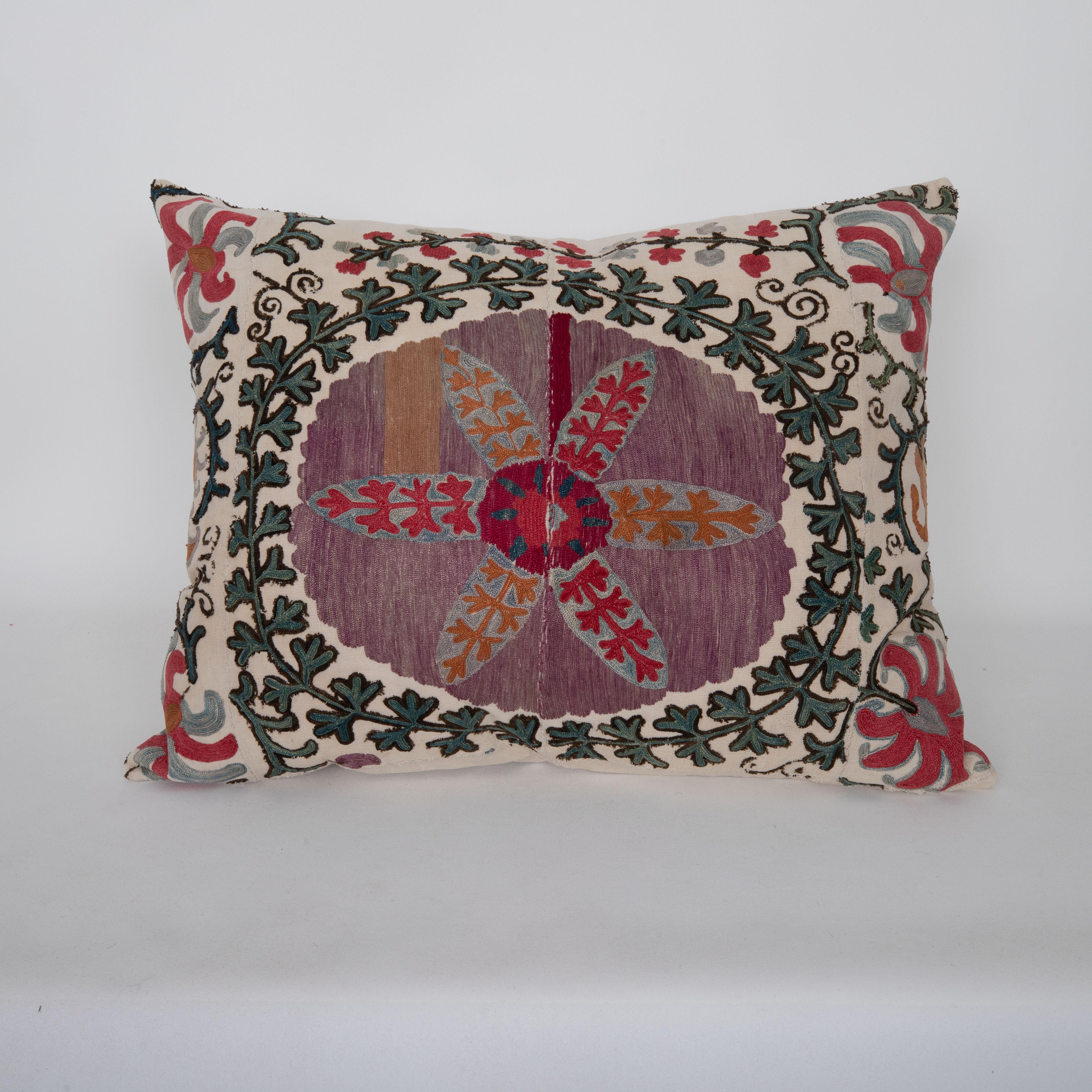 Uzbek Antique pillow cover Made from a 19th C. Suzani Fragment For Sale