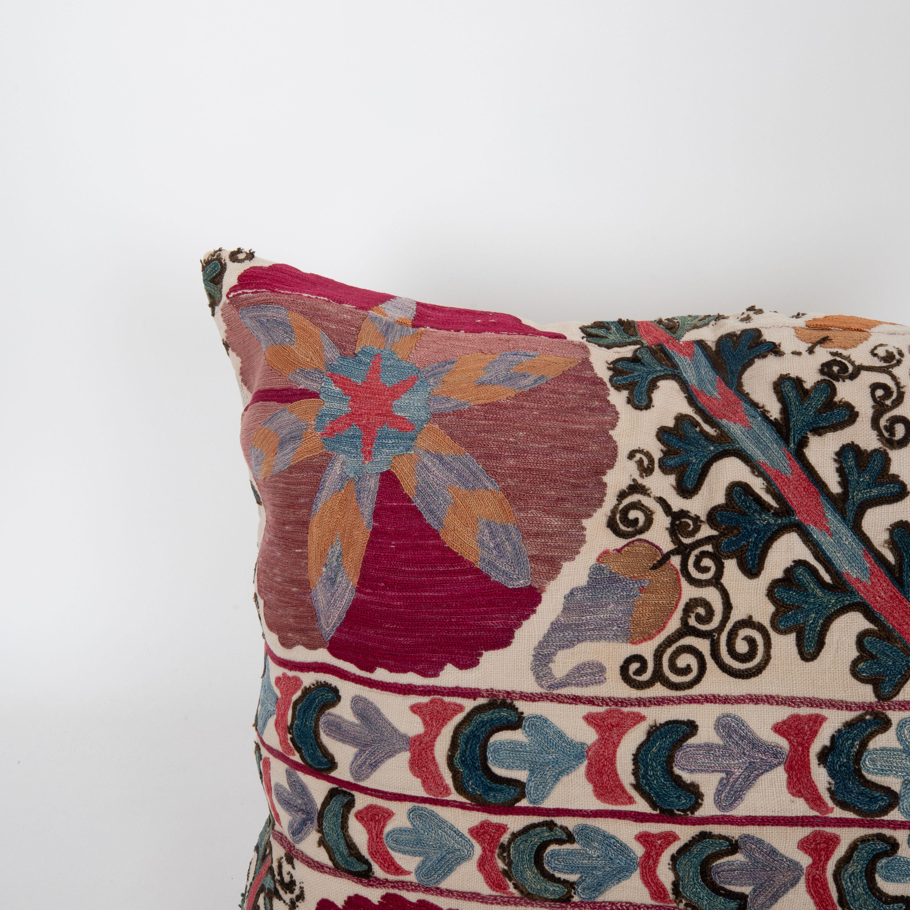 Uzbek Antique pillow Made from a 19th C. Suzani Fragment For Sale