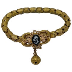 Bracelet ancien à fleurs en similor et sardonyx