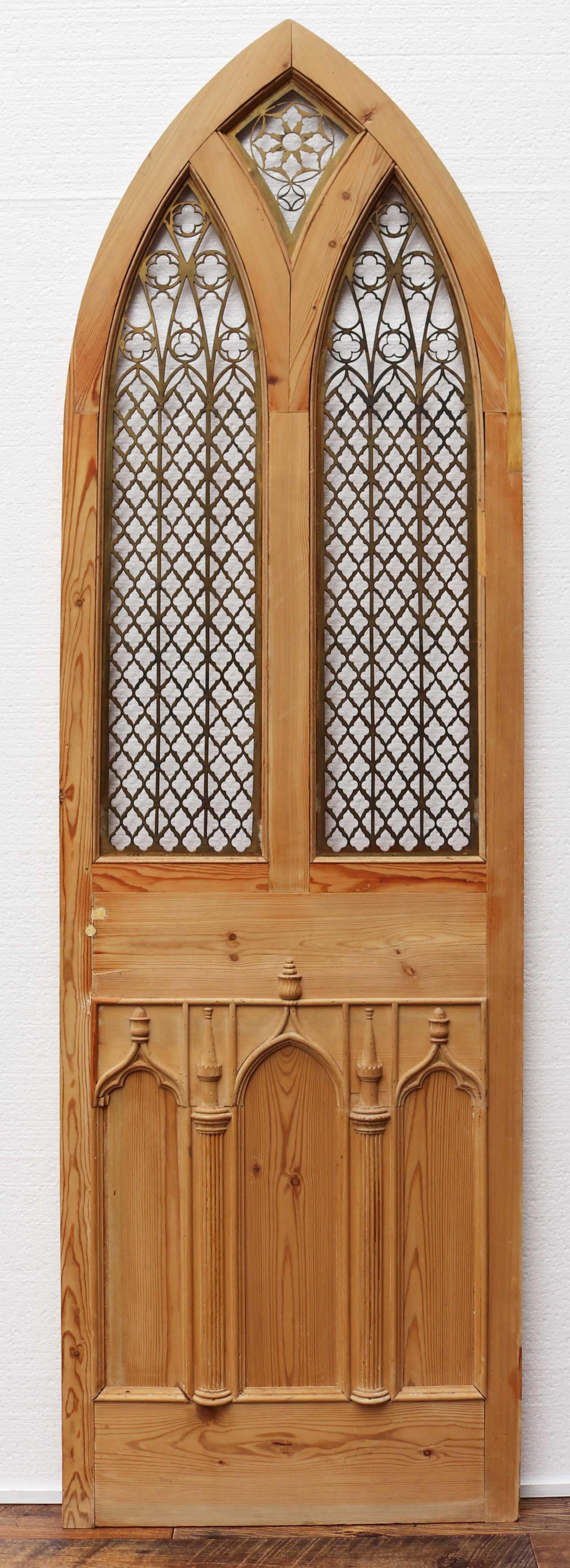 About

This unusual arched pine door features decorative pierced brass grills and decorative molding to the lower half.

We have two of these doors available.

Condition report

There is no glazing present. 

Style

Gothic,
