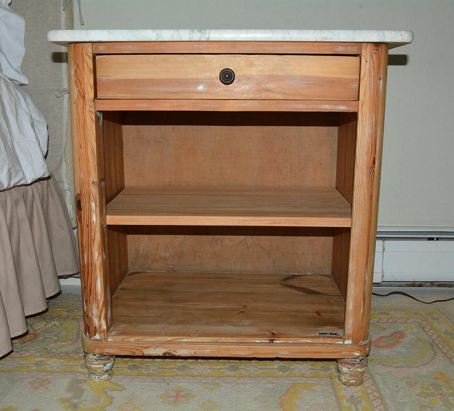 The antique rustic country pine night table or stand has a grooved marble top, single drawer and two shelves. Also perfect as a combined side table and bookcase. The small chest had been painted once but most the paint and been removed.  Some paint