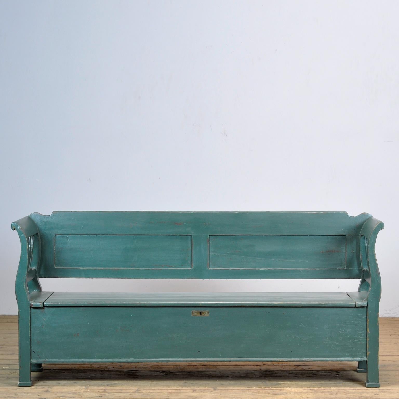 A charming bench from hungary made from pine. Over time and use, the bench has been repainted several times, which gives it character The bench is stable and sturdy. Free of woodworm.