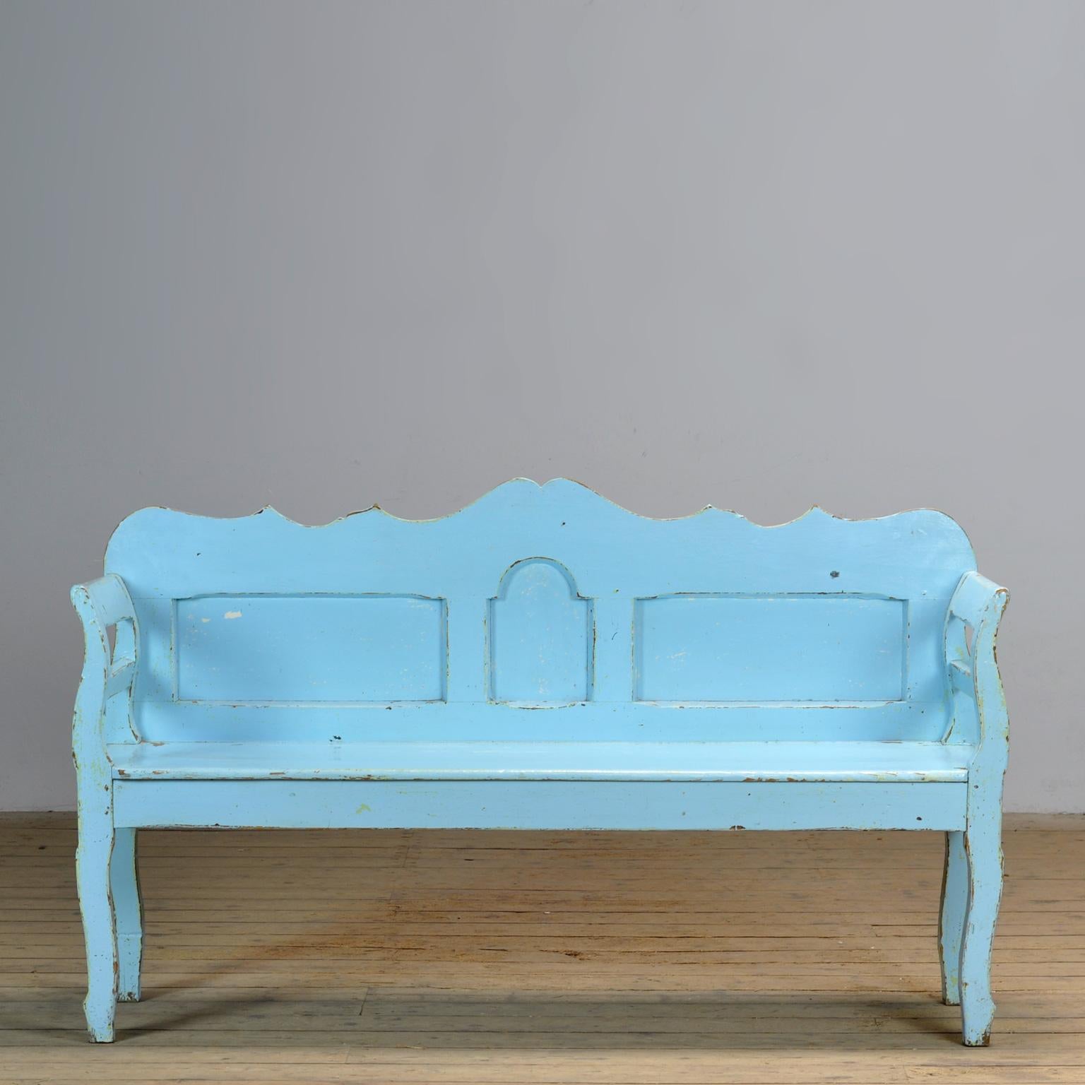 A charming bench from hungary with the original paint. Over time and use, the blue paint has been worn away in places to the wood. The bench is stable and sturdy. Free of woodworm.