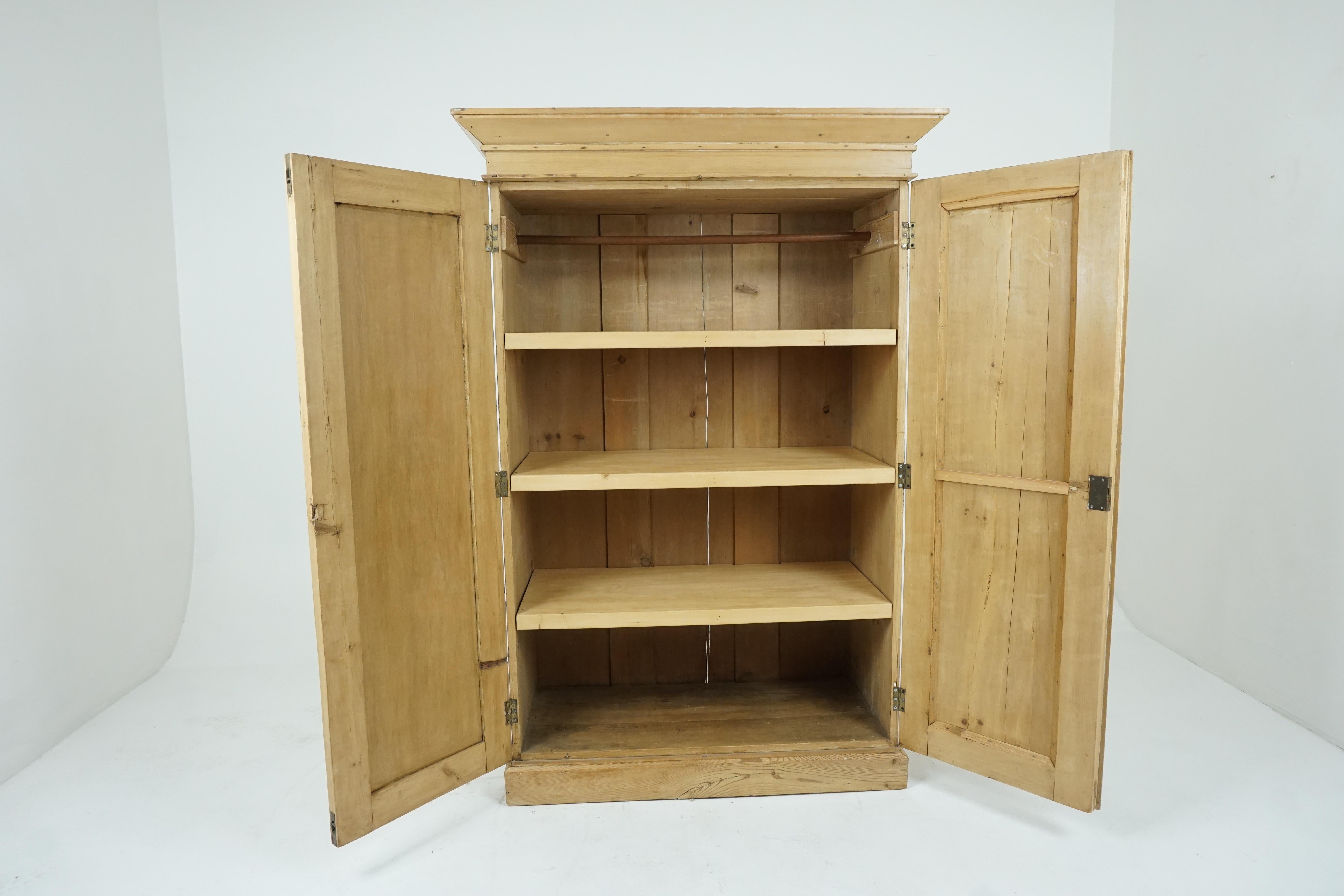 Antique pine cupboard, stripped pine 2 door armoire or pantry, antique furniture, Scotland 1880, B1956

Scotland 1880
Solid pine
Wax finish
Moulded cornice above
Pair of full length paneled doors with porcelain handle
Three fixed shelves on