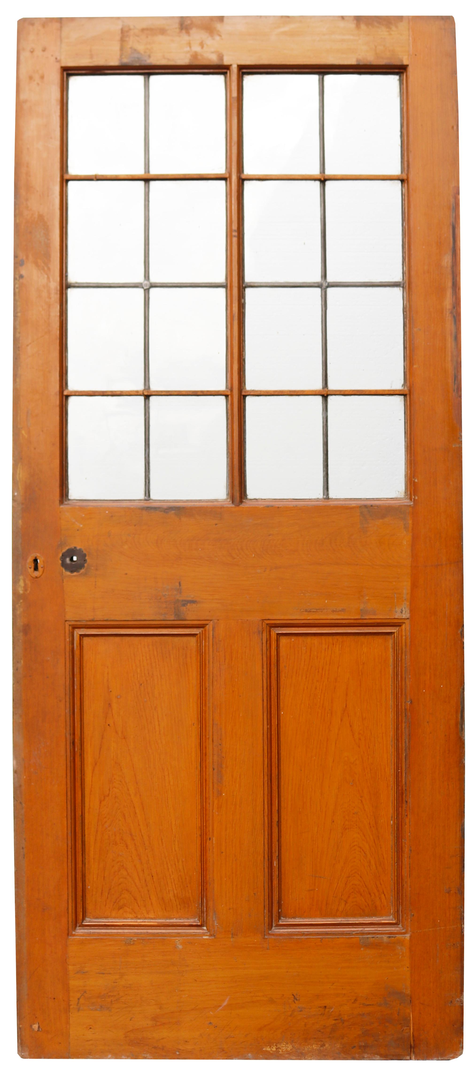 An antique glazed and leaded pine door. This door is suitable for use as a front door.

Glass is in excellent condition with no breaks.