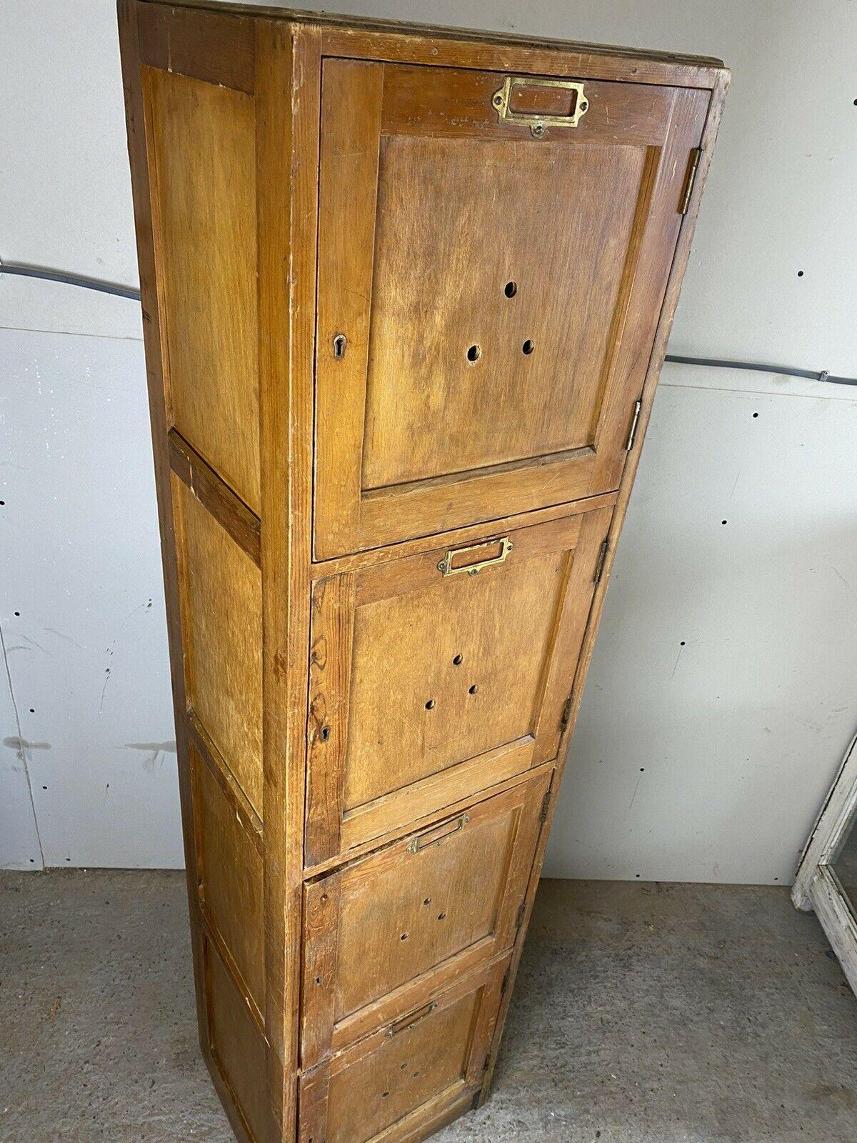 Antique Pine English School cupboard locker, c 1940.
A charming and completely original pine English school locker cupboard dating from the 1940s. In original condition throughout, very solid and sturdy. No sign of woodworm or infestation.
Four