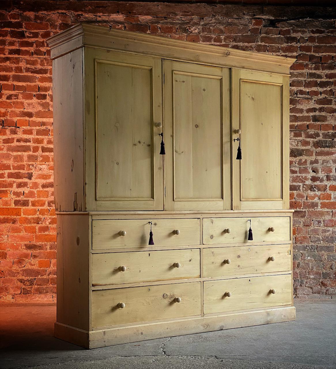 Antique pine housekeepers cupboard 19th century Victorian, circa 1890.

Fabulous large Victorian ‘English Country House’ stripped pine housekeepers cupboard 19th century circa 1890, the corniced top above three panelled doors with four adjustable