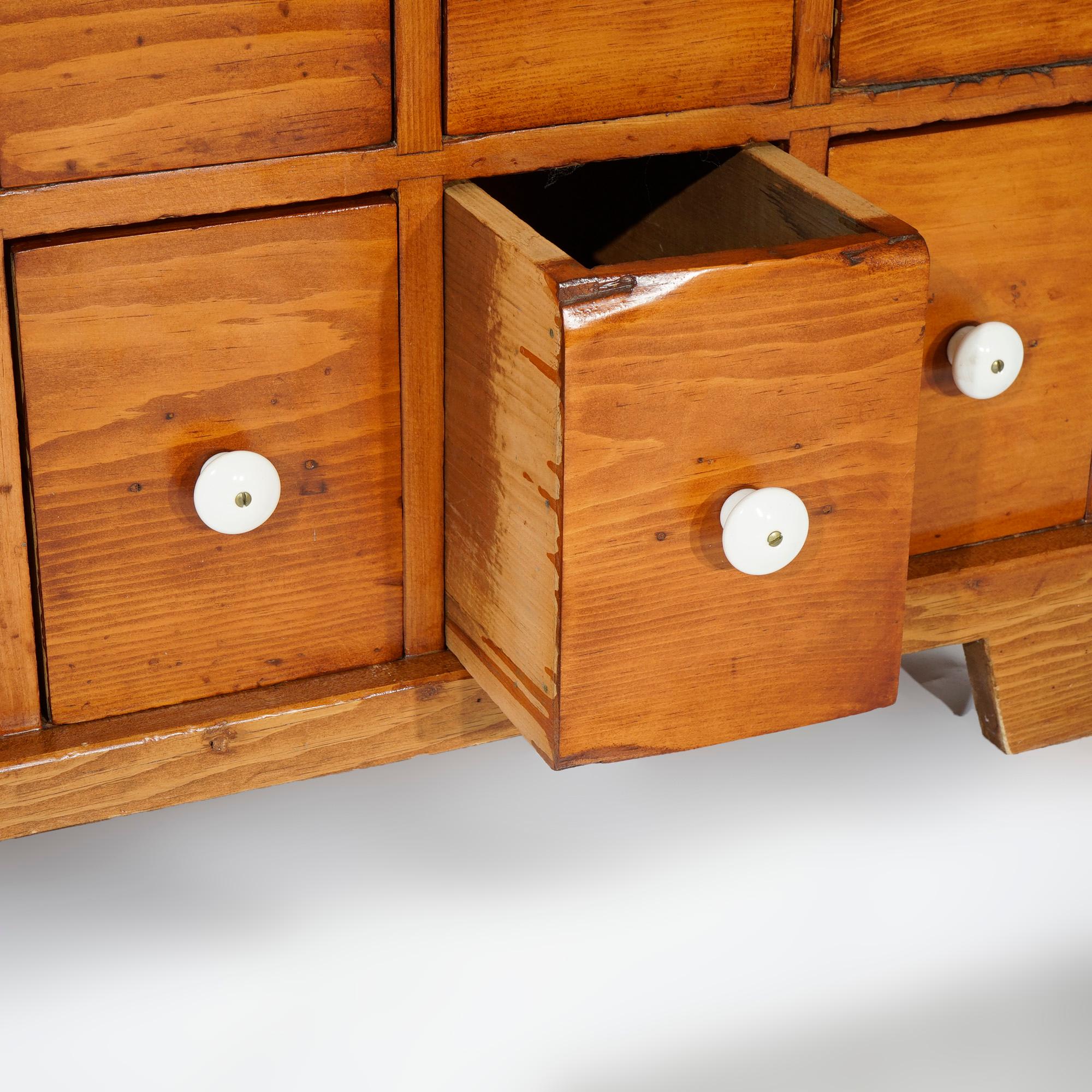 Antique Pine Twelve-Drawer Apothecary Cabinet with Porcelain Knobs, 19th C For Sale 8