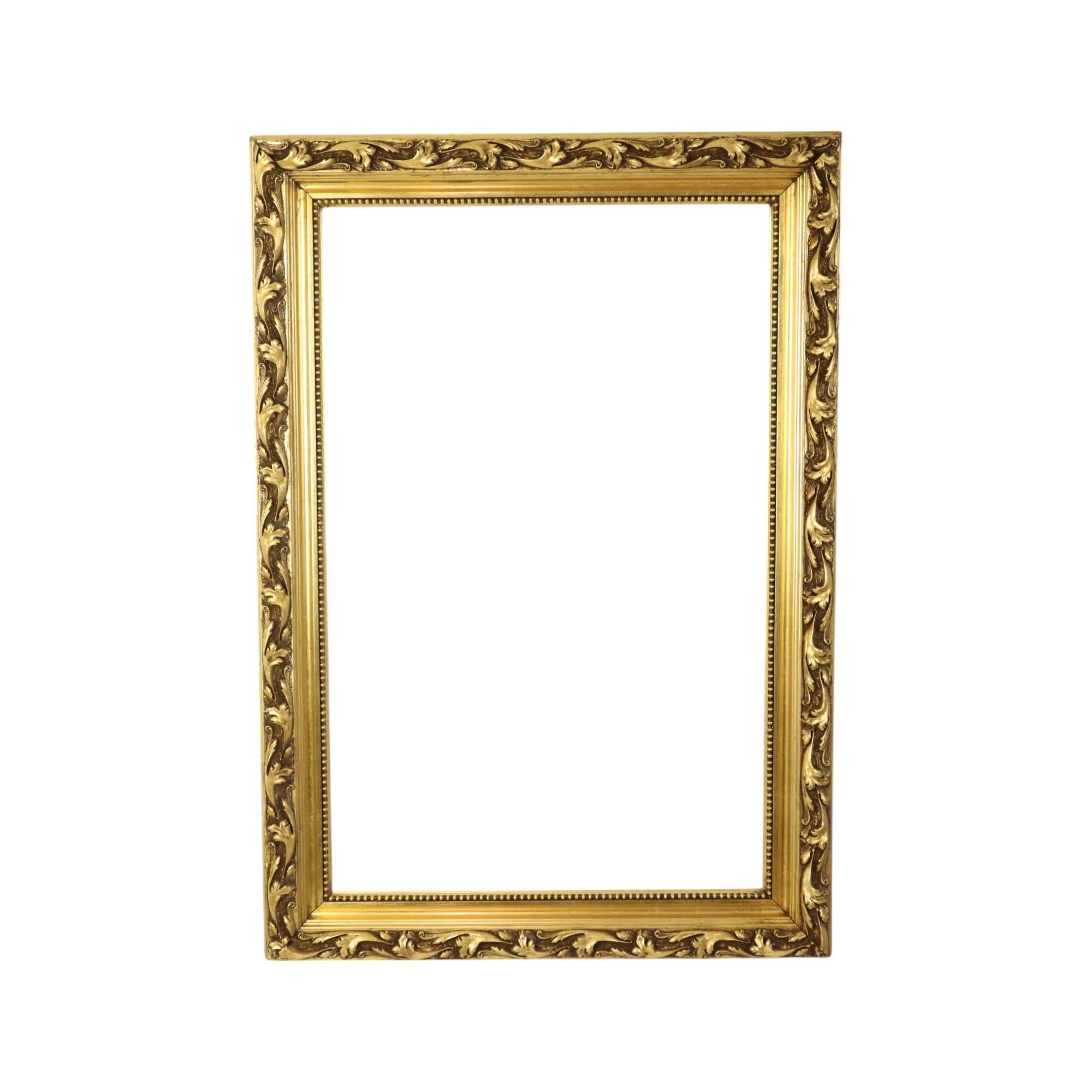Beautiful large antique baroque style frame made of pine wood and gesso acanthus decoration in relief, the whole is gilded with gold leaf, the frame is a beautiful example of how elegant and graceful a picture frame can be, probably Belgian, first