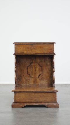 Antique pinewood church pew with storage compartments from the 18th century