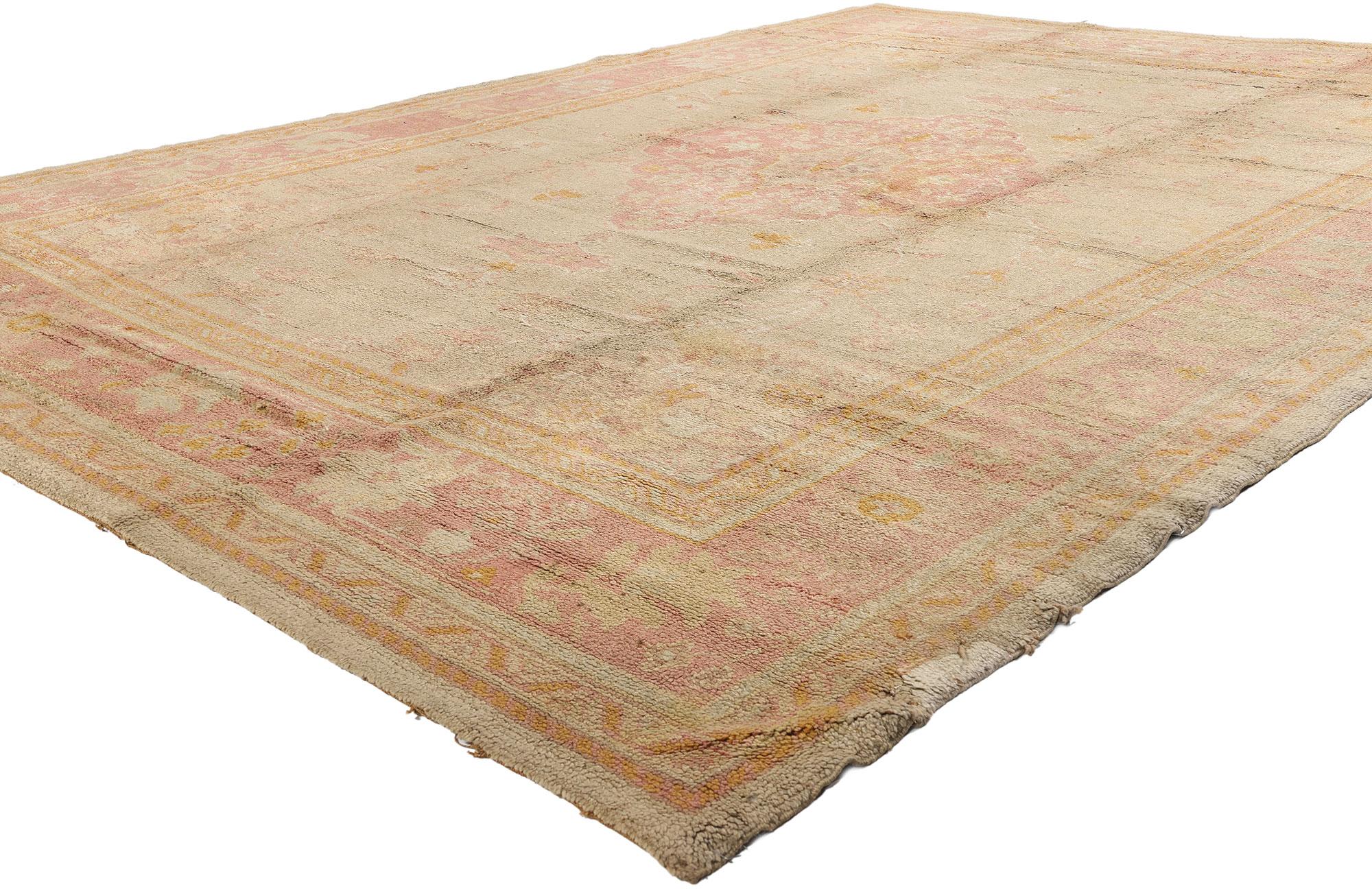 74018 Late 19th Century Antique European Oushak Rug, 09'07 x 13'02. Whispering tales of a bygone era, this exquisite hand knotted wool Late 19th Century antique European Oushak rug is a vision of delicate refinement and timeless allure. Its ethereal