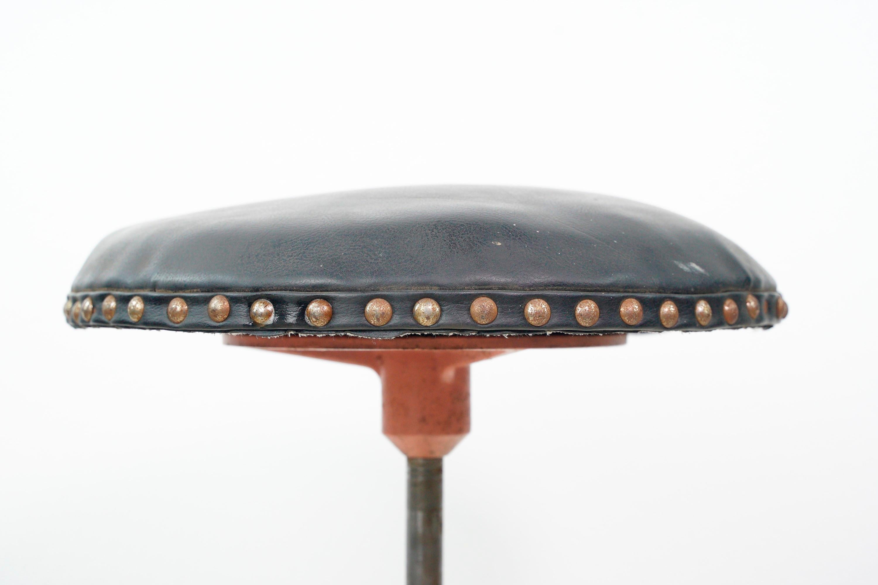 Industrial Antique Pink Cast Iron Base Adjustable Black Leather Stool For Sale