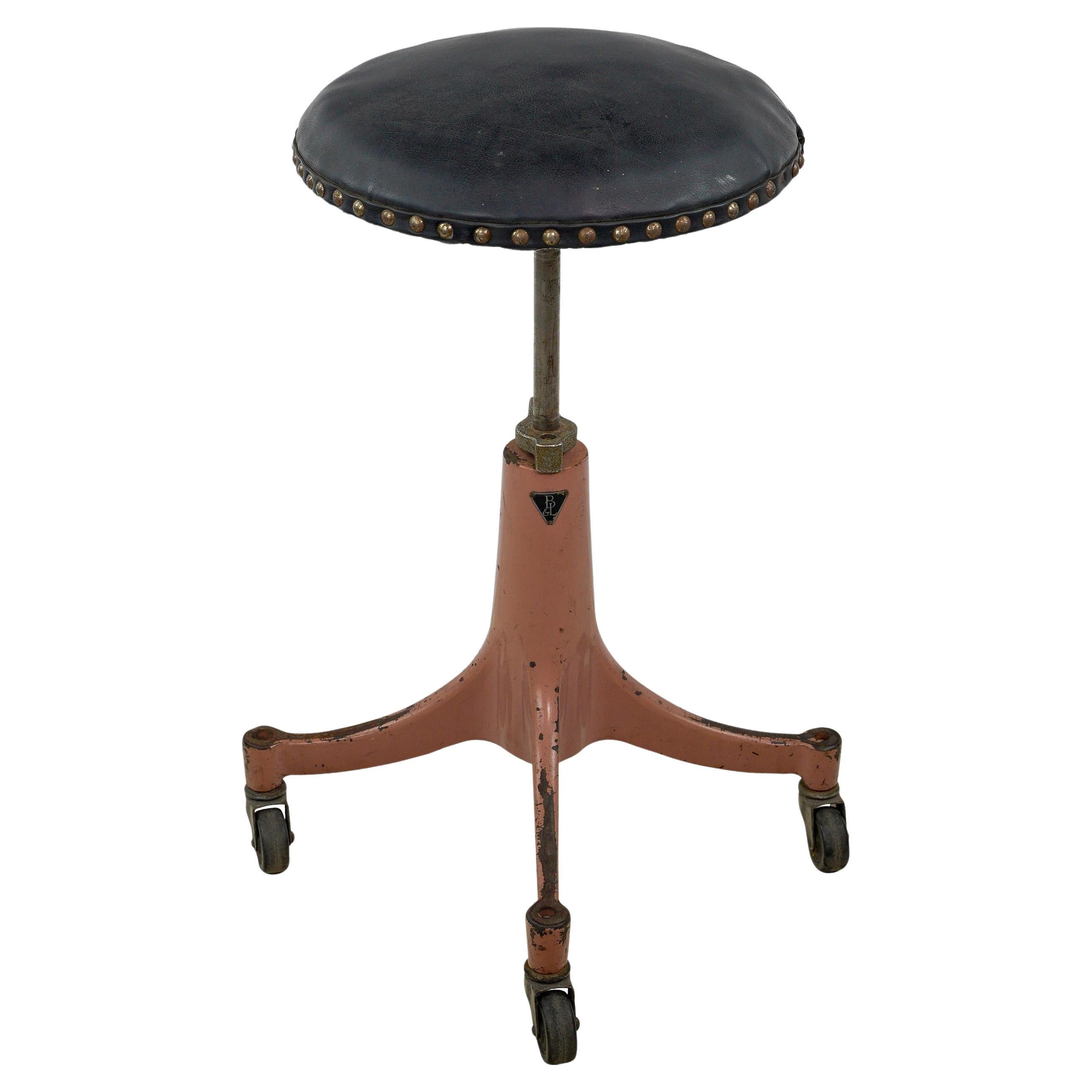 Antique Pink Cast Iron Base Adjustable Black Leather Stool For Sale