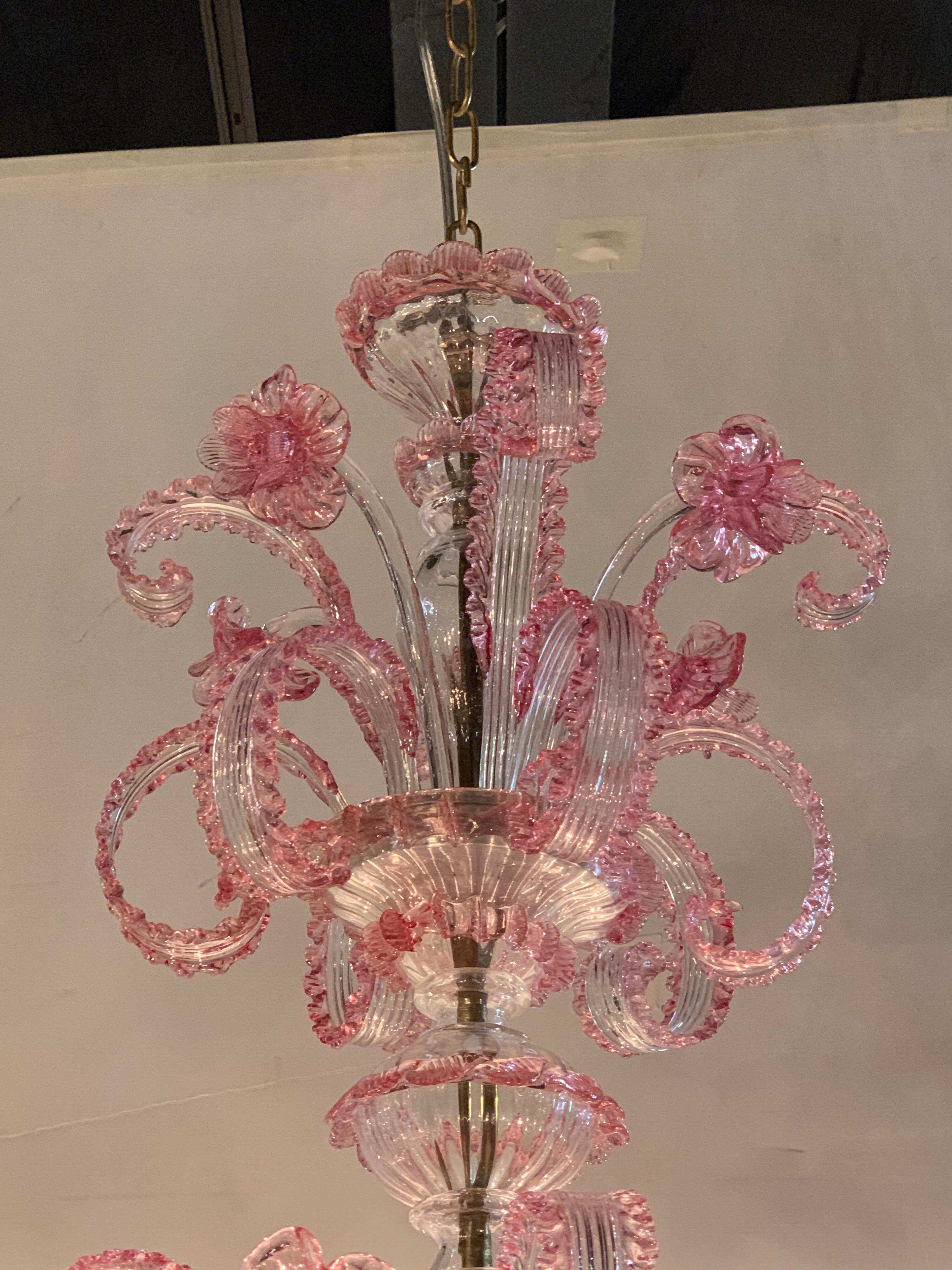 Gorgeous antique pink Murano glass chandelier with 8 lights. Beautiful details featuring flowers and leaves in a lovely shade of pink. Amazing craftsmanship and elegance to this piece!