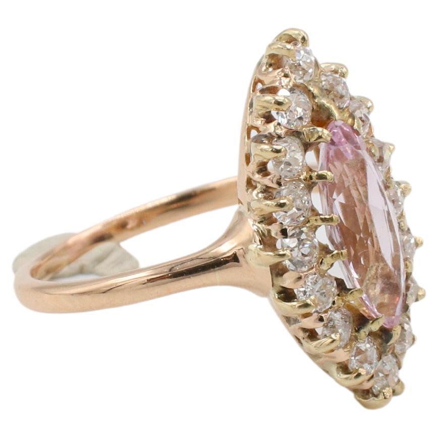 Antique Pink Topaz & Old Mine Cut Natural Diamond Navette Cocktail Ring 
Metal: 14k rose gold
Weight: 3.4 grams
Topaz: Pink, 11.1 x 4.7mm
Diamonds: Approx. 0.40 CTW G-H VS natural old mind cut diamonds
Size: 5 (US)
Top: 18.5 x 10.5mm