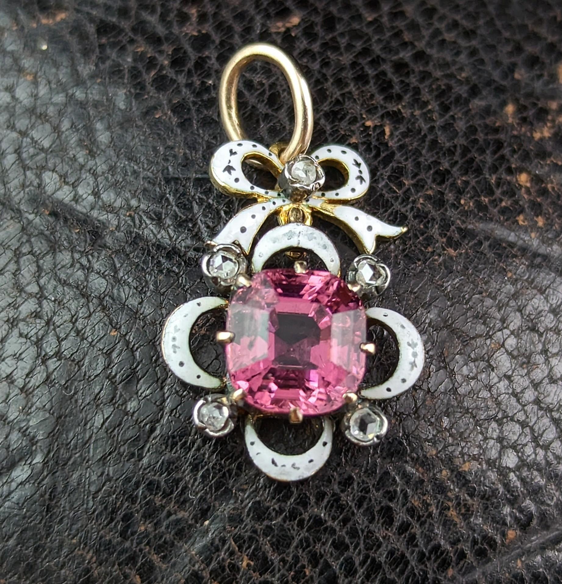 This stunning Victorian Tourmaline, diamond and enamel pendant is truly a beauty!

Pretty, feminine and perfect.

It is an unusual piece, beautifully crafted and both elegant and statement at the same time, it is dainty in size but big on
