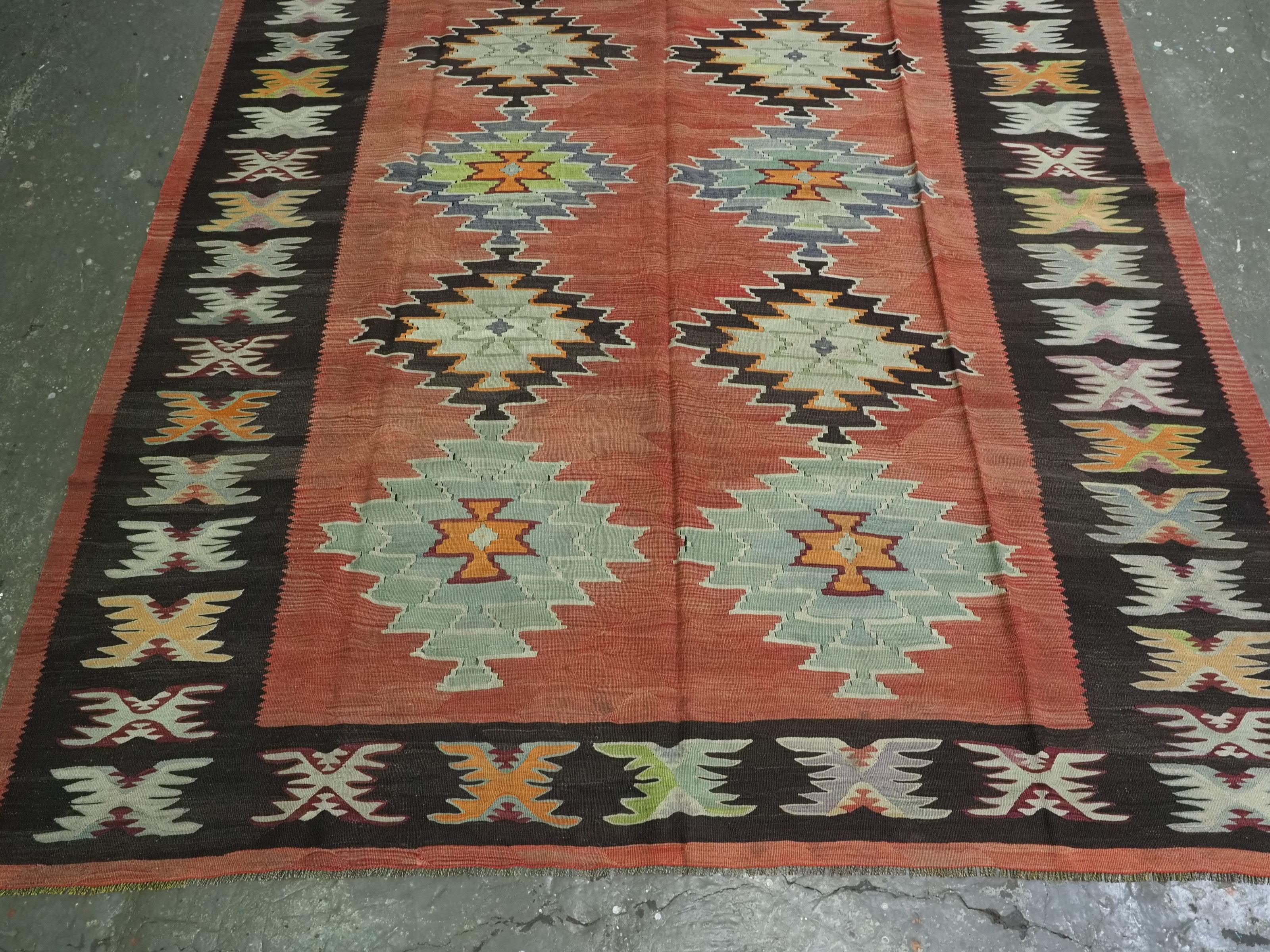 Early 20th Century Antique Pirot / Sarkoy kilim of repeat diamond medallion design, circa 1920. For Sale