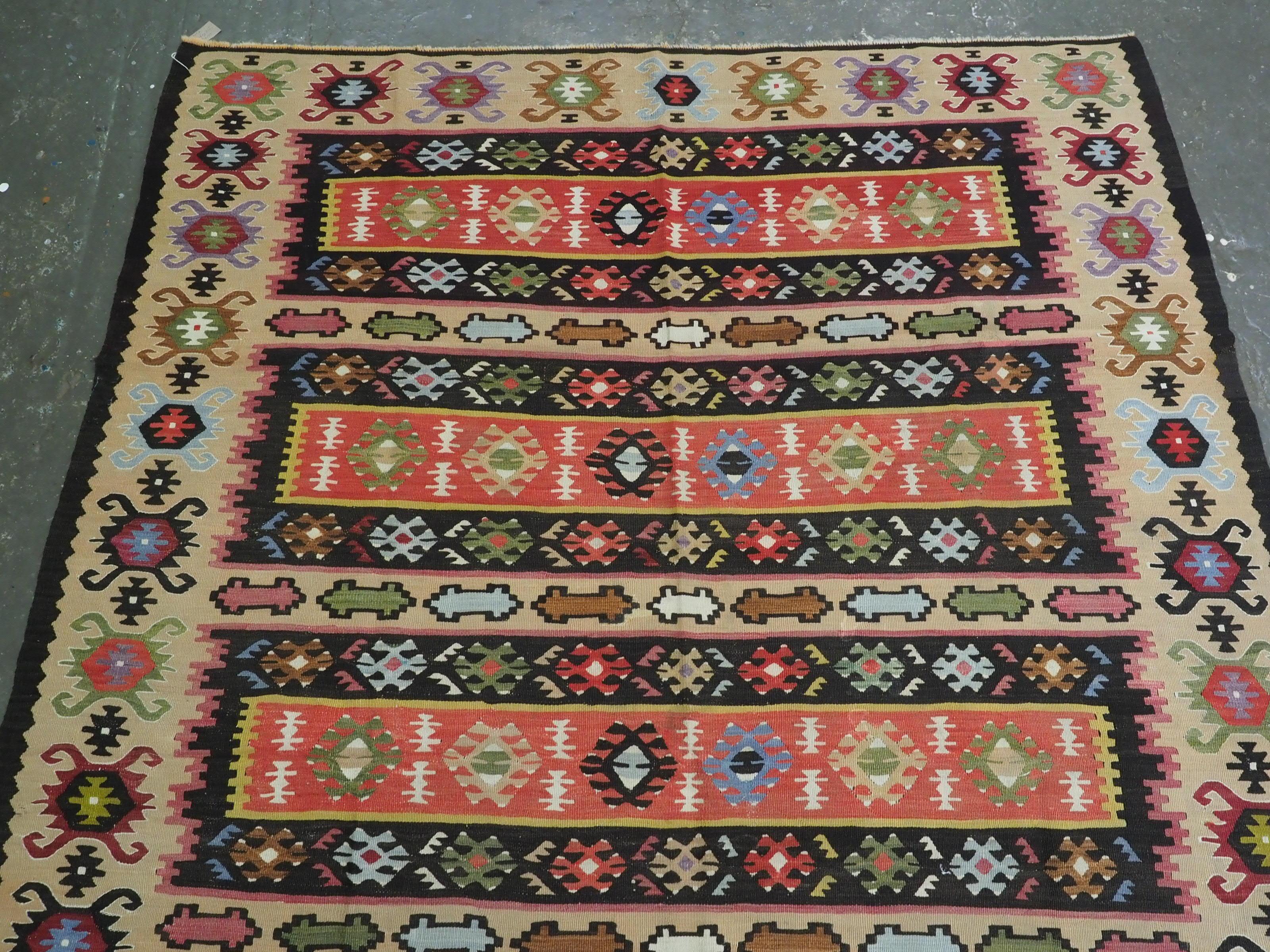 Caucasian Antique Pirot / Sarkoy kilim of traditional banded design, circa 1920. For Sale