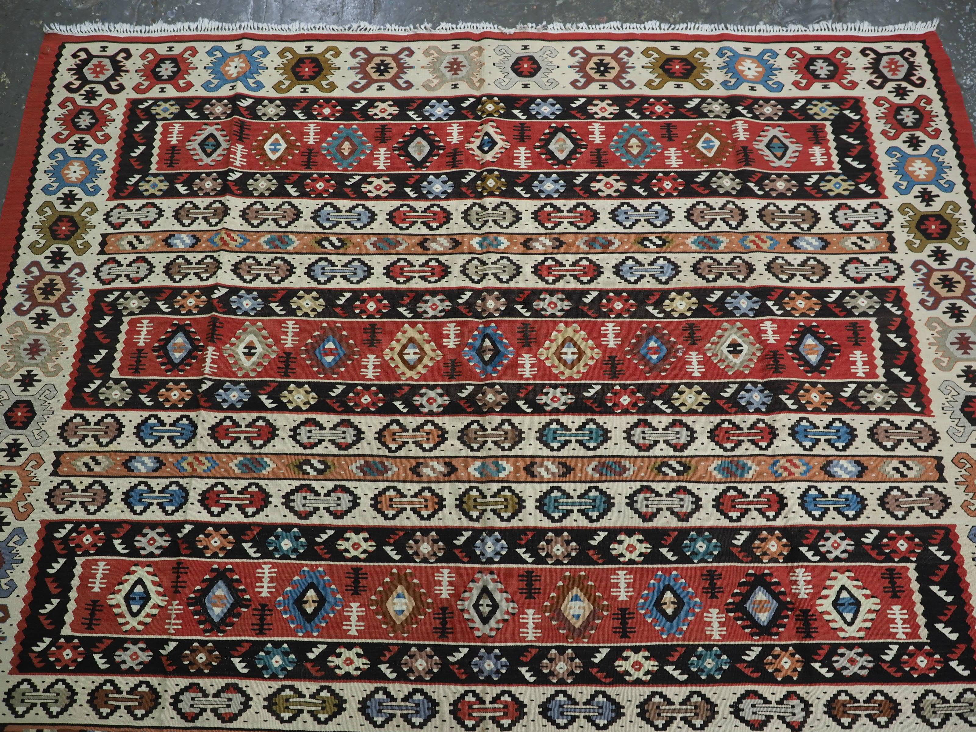 Caucasian Antique Pirot / Sarkoy kilim of traditional banded design, circa 1920. For Sale