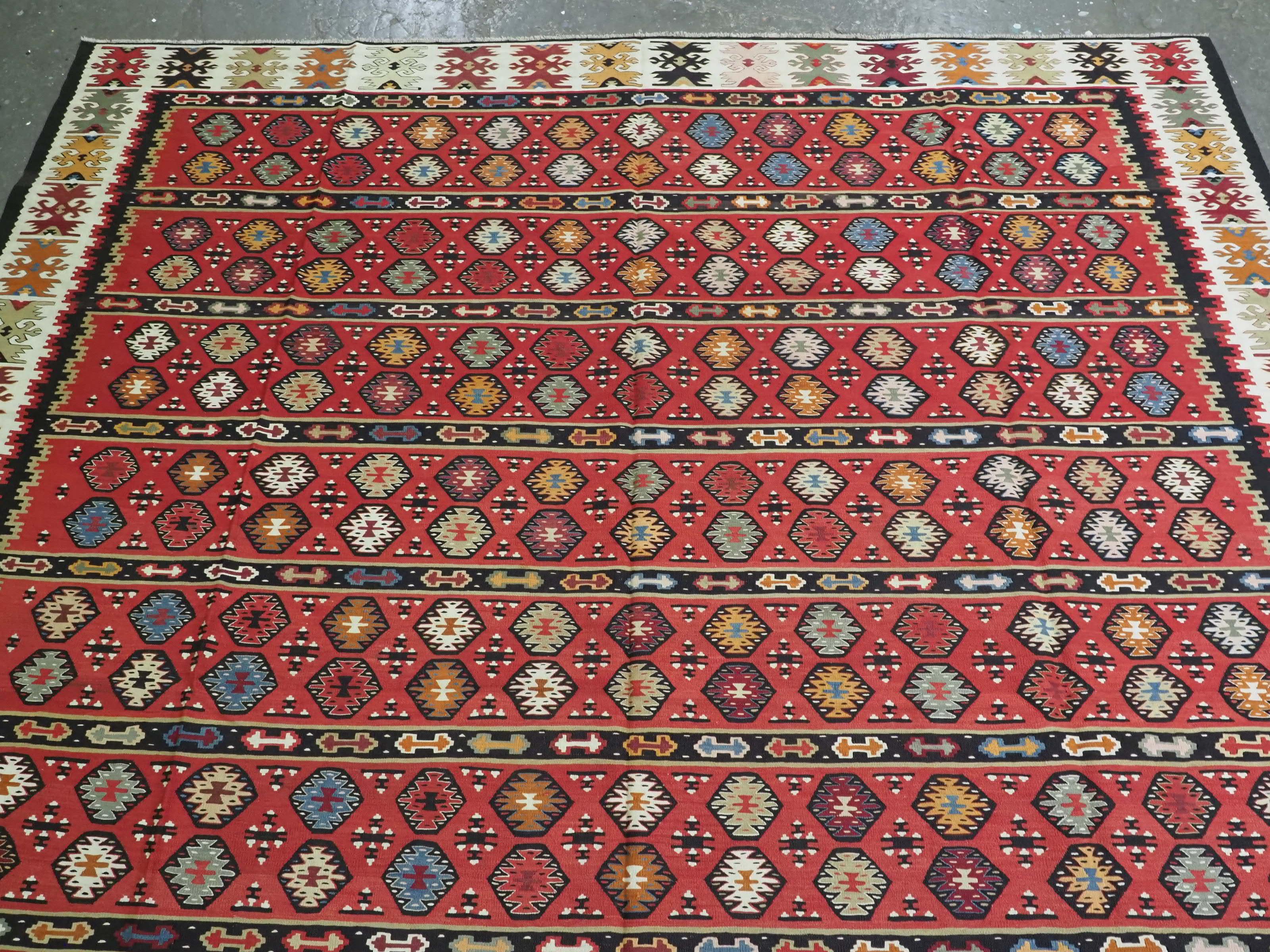 Caucasian Antique Pirot / Sarkoy kilim of traditional fine banded design, circa 1920. For Sale