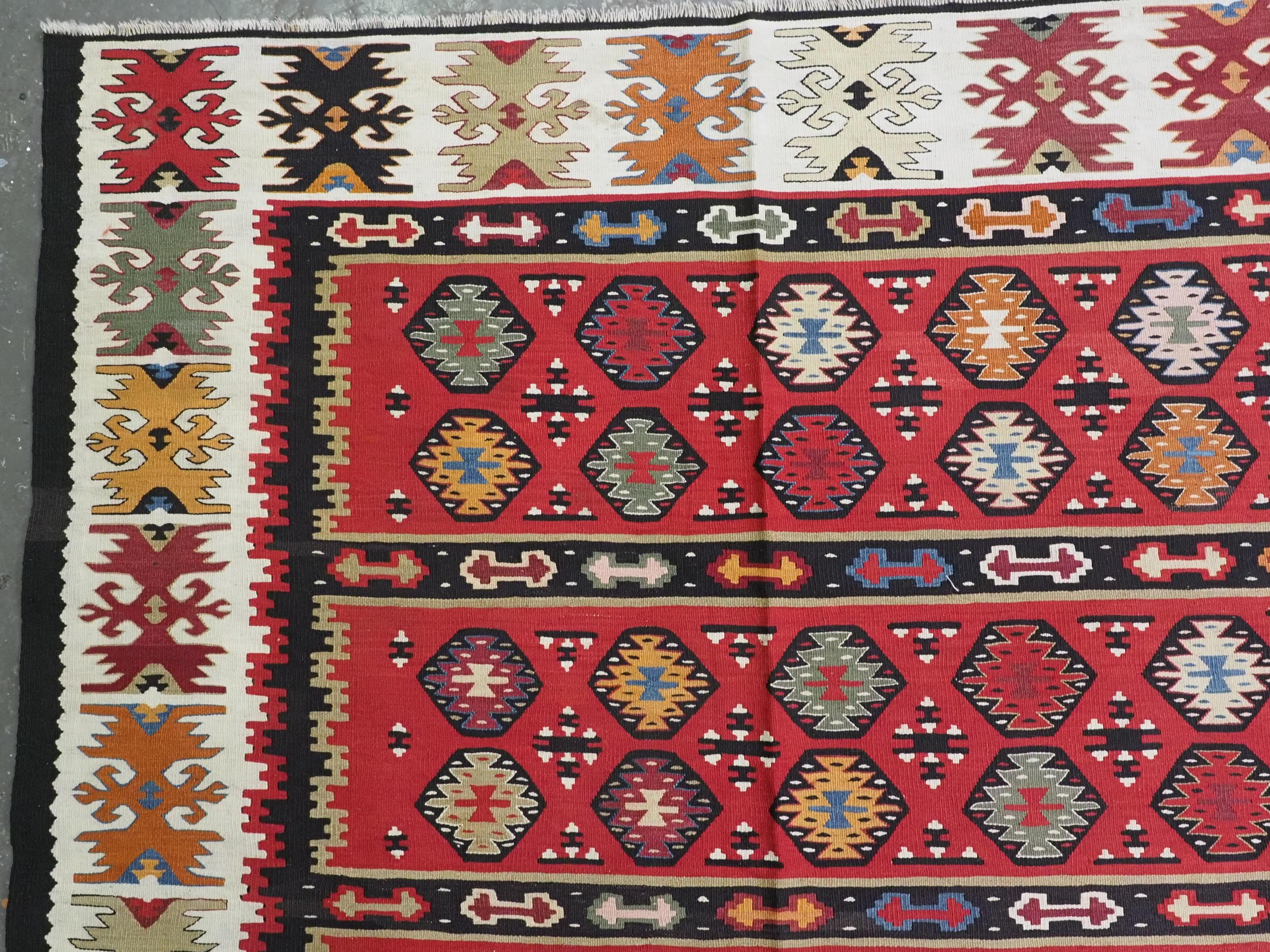 Wool Antique Pirot / Sarkoy kilim of traditional fine banded design, circa 1920. For Sale