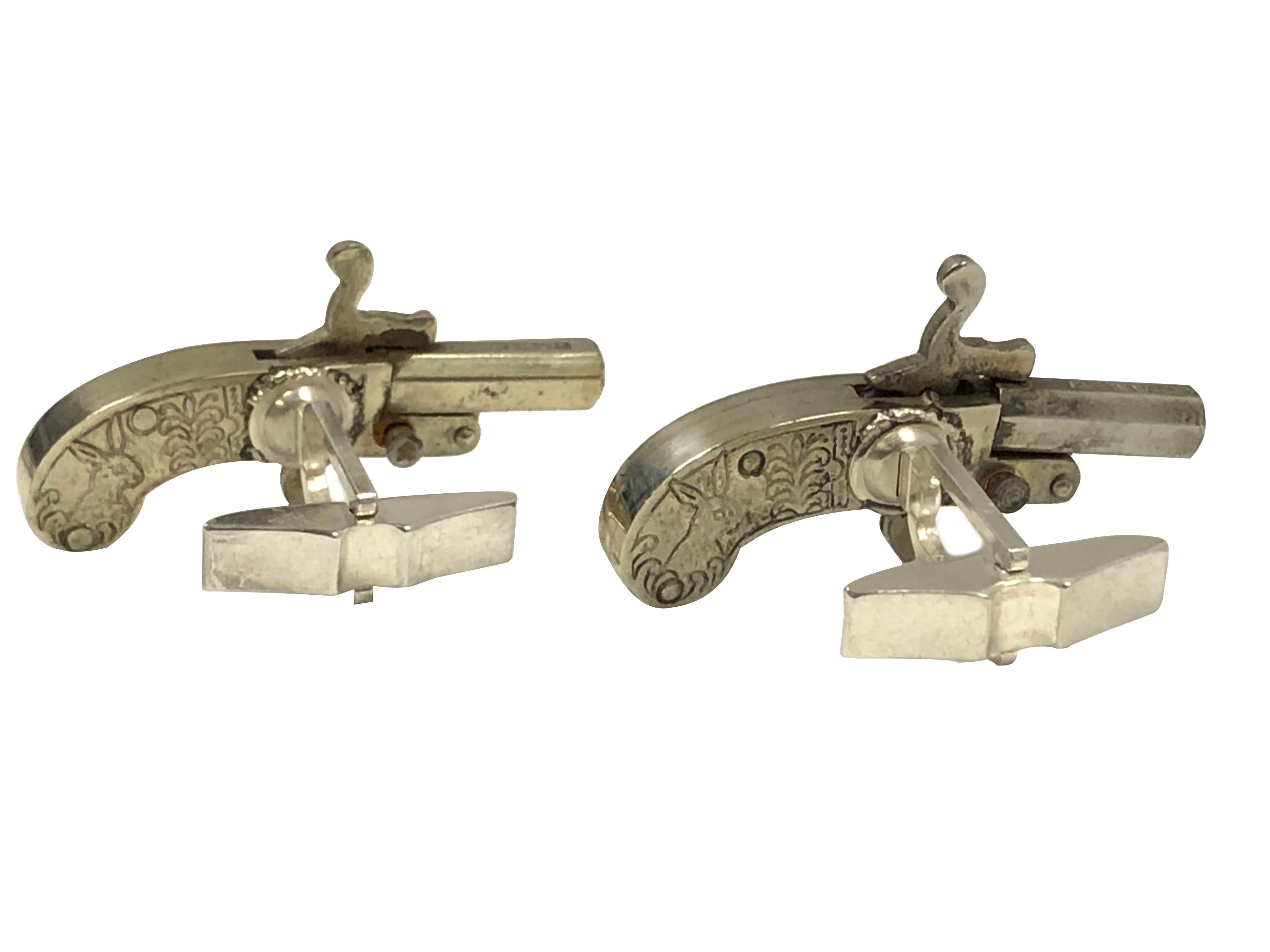 Circa 1930 Austrian Miniature Pistol Cufflinks, Nickle metal, measuring 1 1/2 inch in length, Sterling Silver Toggle backs for easy on and off, all mechanics on these are fully functional as these originally fired a cap.