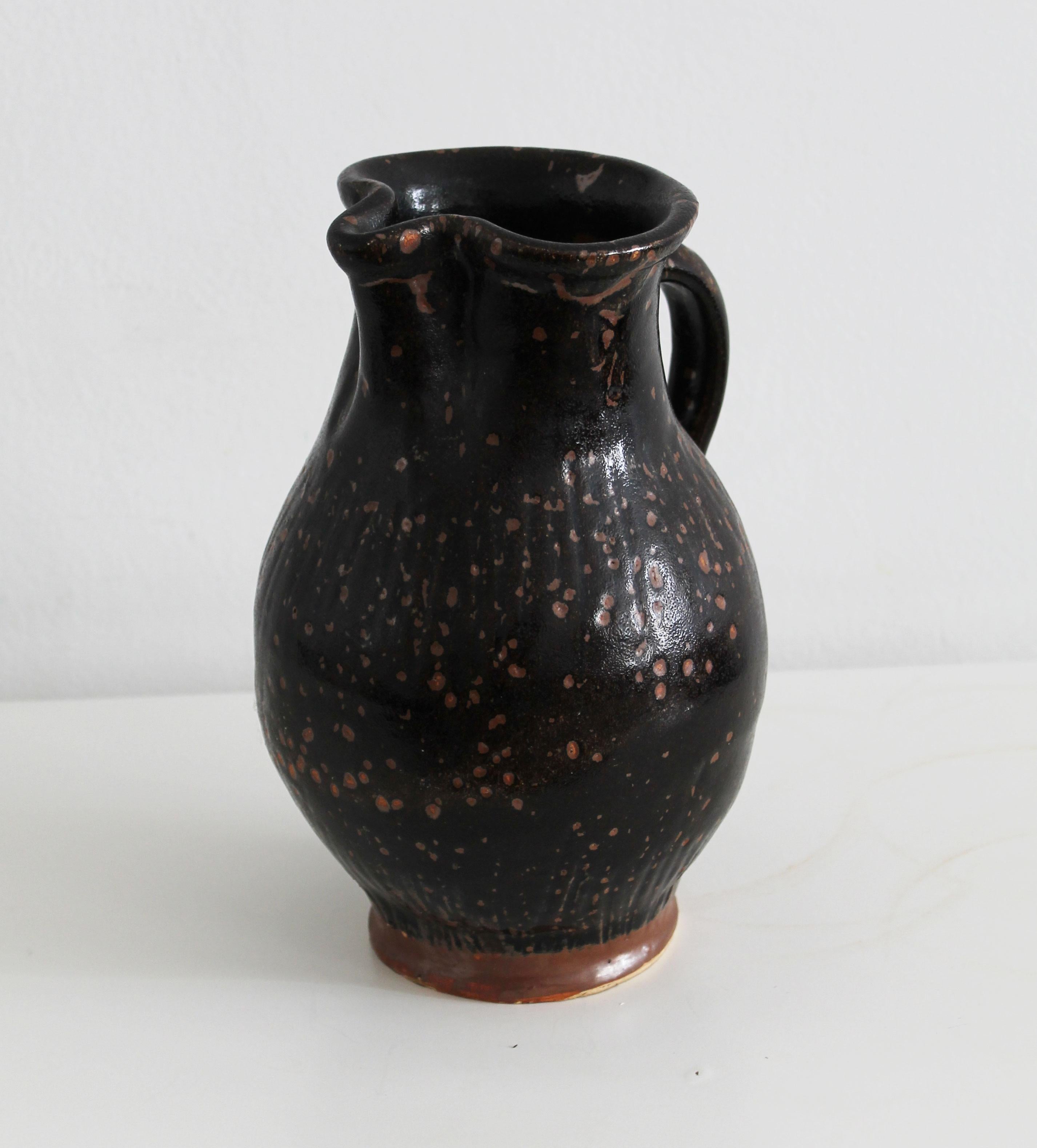 Art Nouveau Antique pitcher made of dark glazed stoneware For Sale