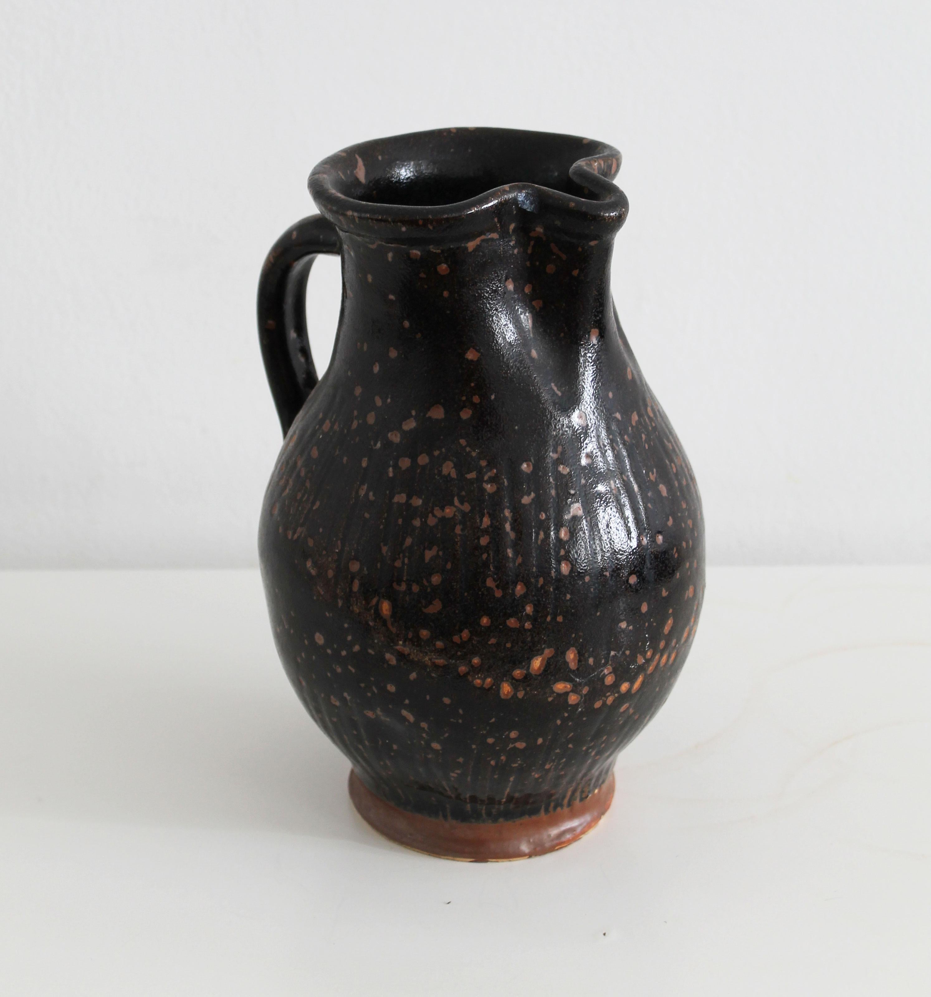Antique pitcher made of dark glazed stoneware In Good Condition For Sale In Brno, CZ