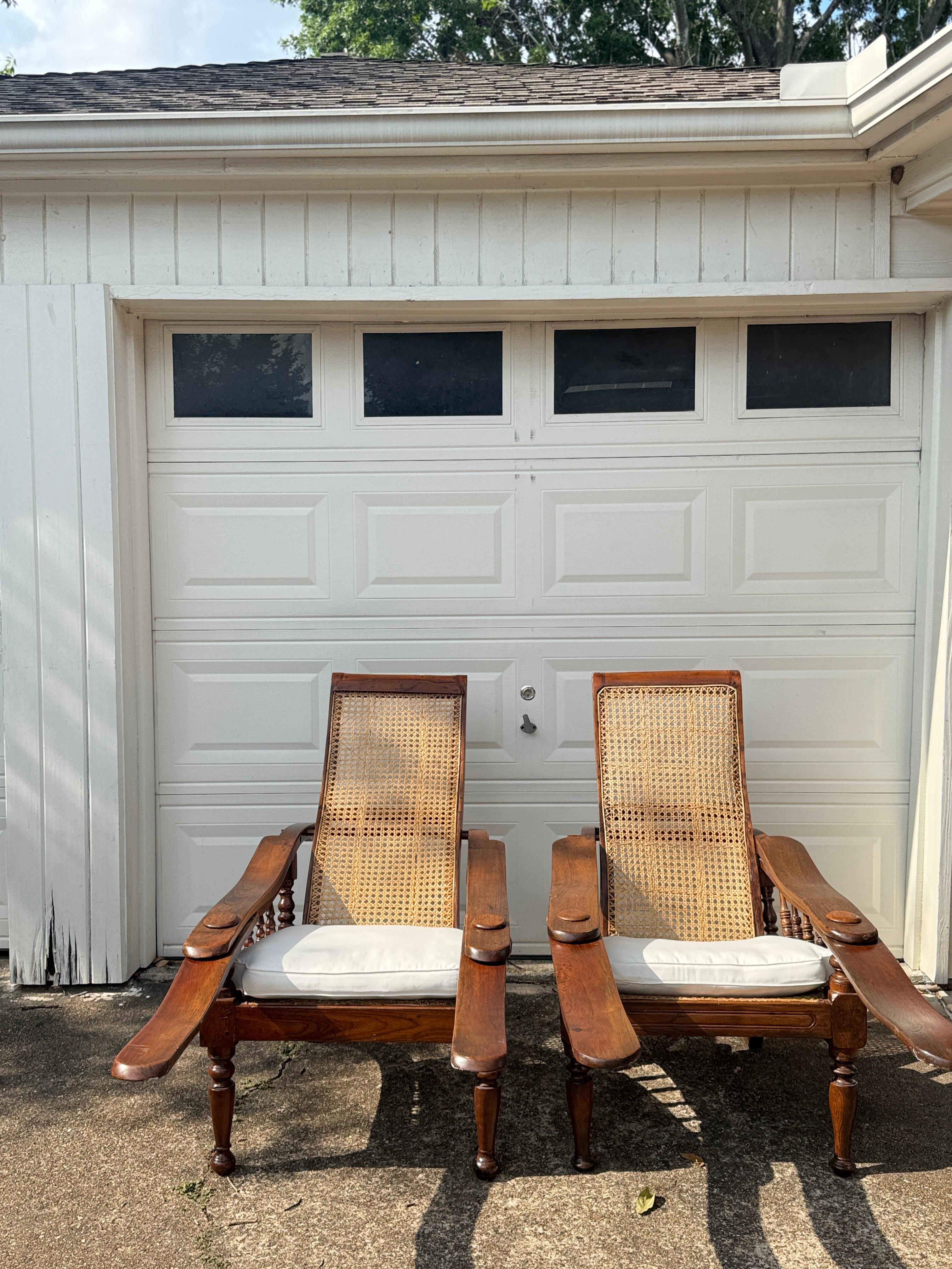 Antique plantation chair with handwoven cane and fold out footrests, circa 1920S For Sale 10