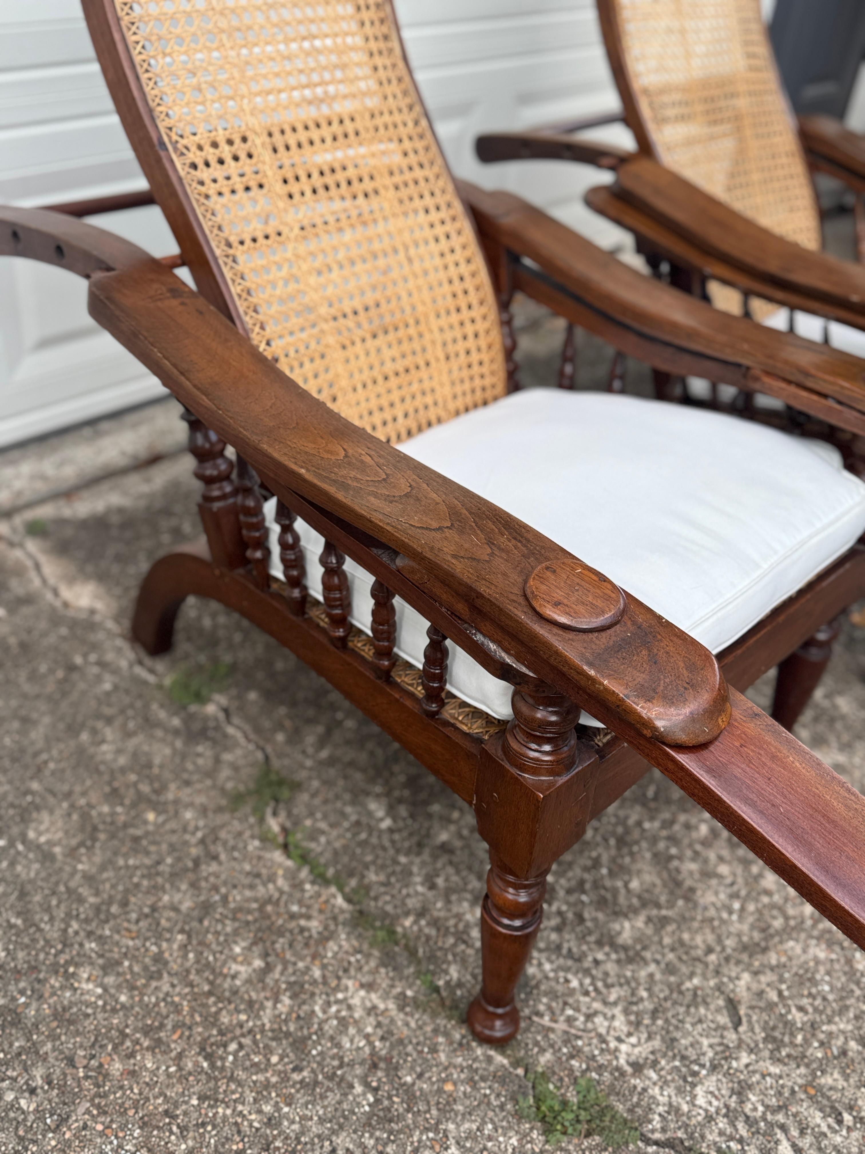 Antique plantation chair with handwoven cane and fold out footrests, circa 1920S In Good Condition For Sale In Houston, TX