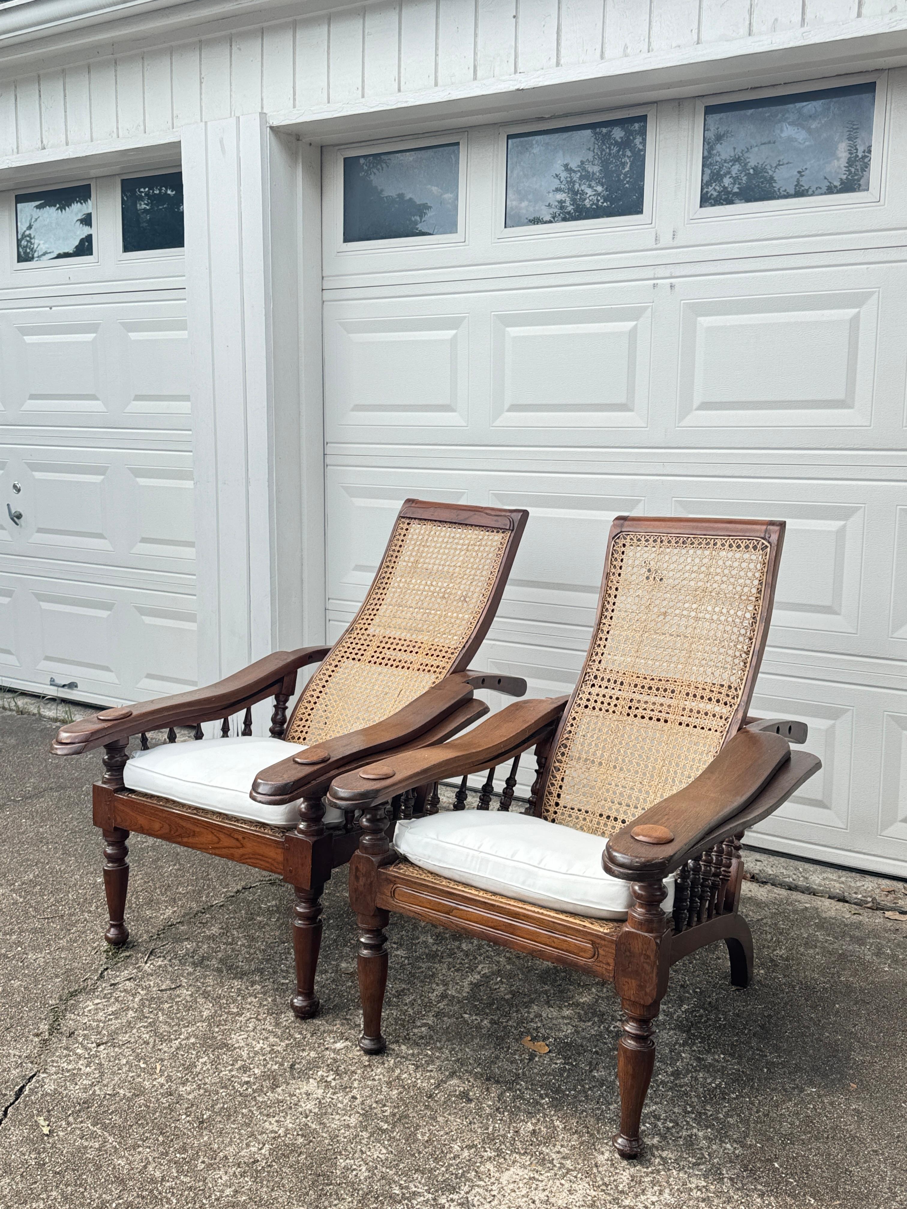 Antique plantation chair with handwoven cane and fold out footrests, circa 1920S For Sale 2