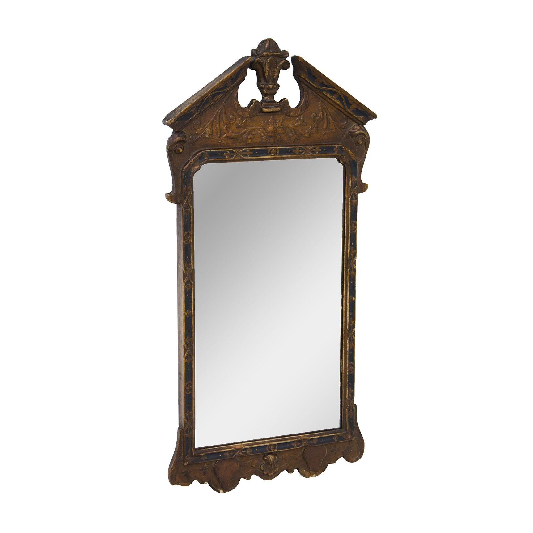 Antique plaster mirror with wooden framing. No maker's marks. 
Condition notes: Some chips in places and pleasing, age-appropriate wear / patina. 
Dimensions: 18