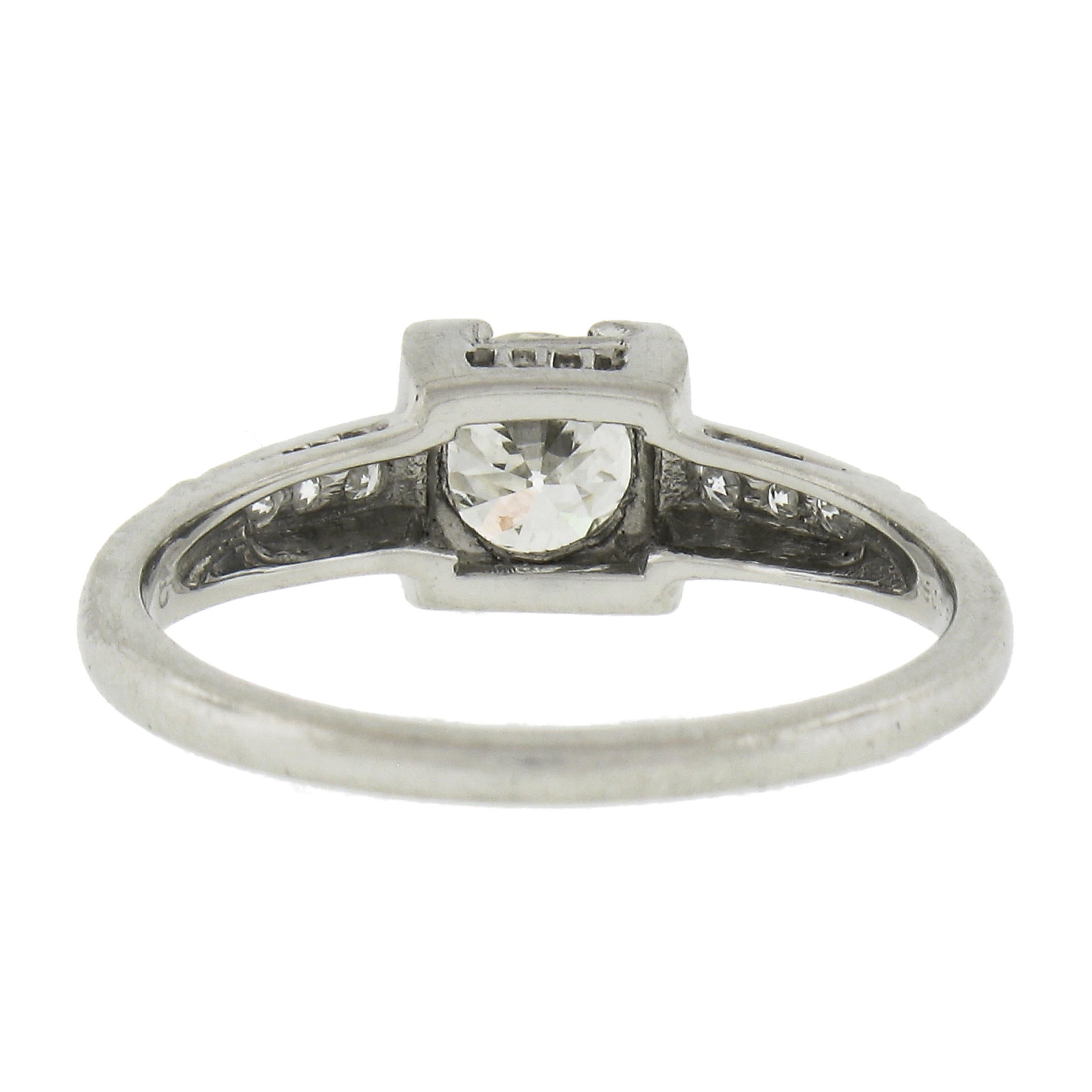 Antique Platinum 0.60ctw Old European Cut Diamond Floral Work Engagement Ring For Sale 2