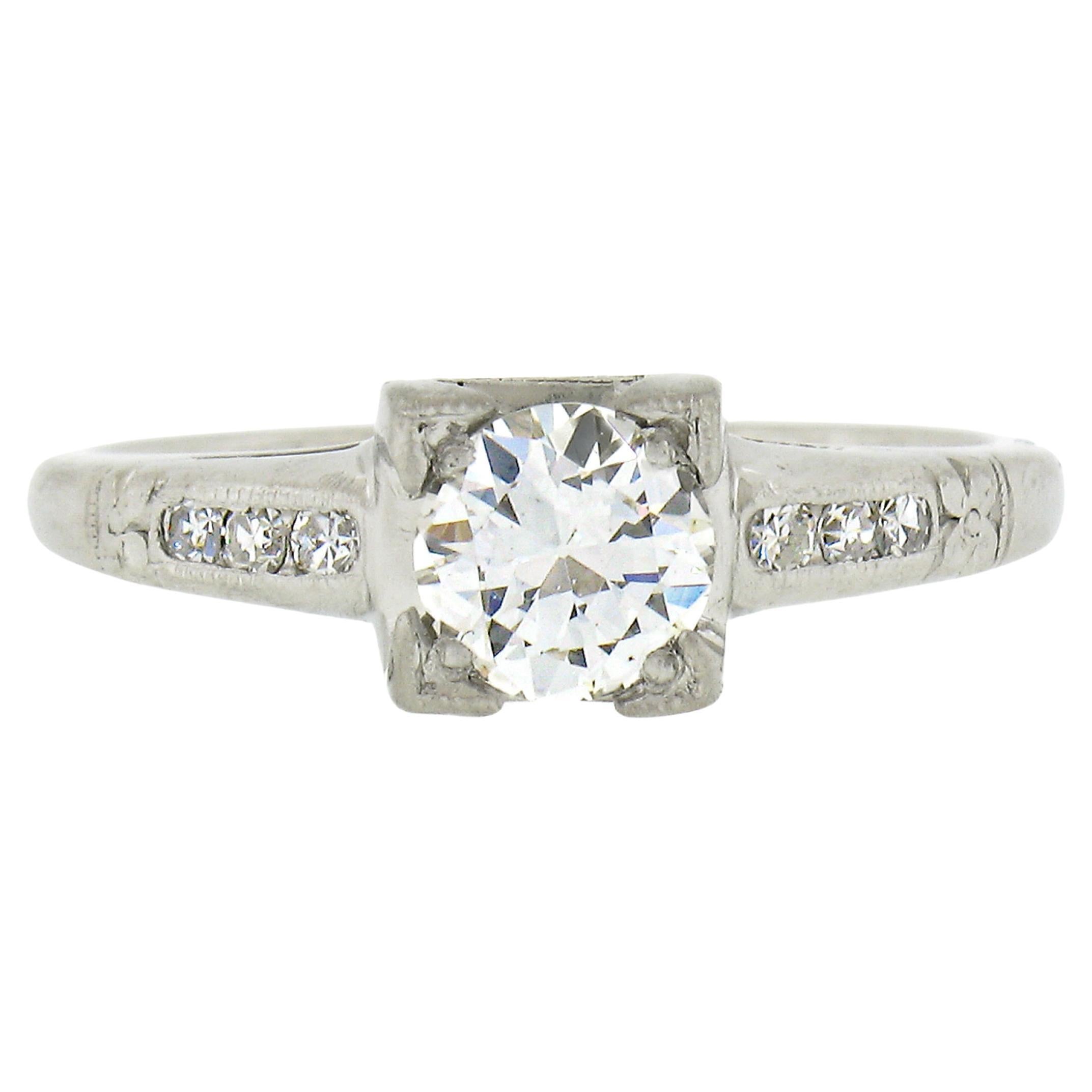 Antique Platinum 0.60ctw Old European Cut Diamond Floral Work Engagement Ring For Sale